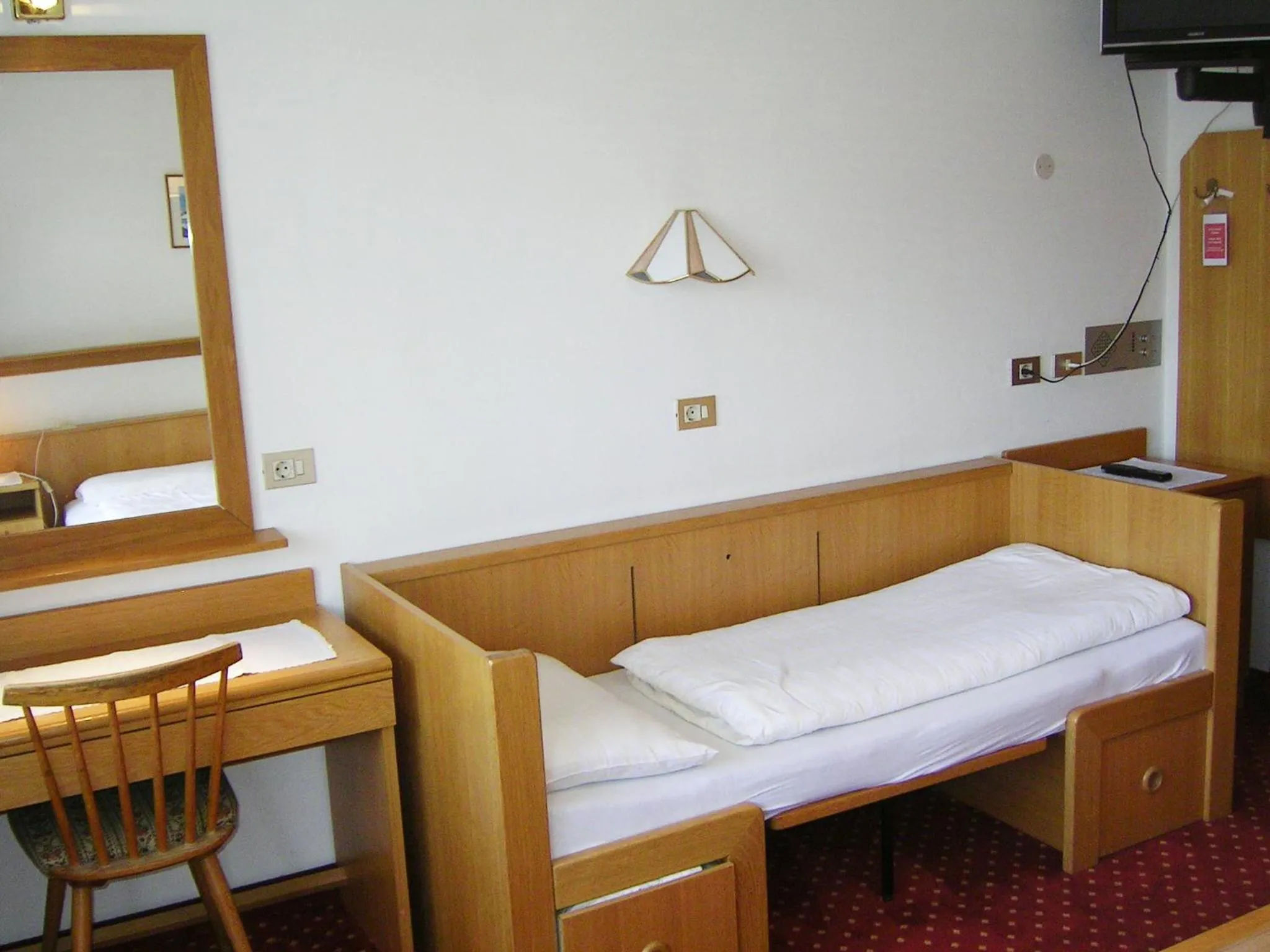 Bed in Hotel Rainegg