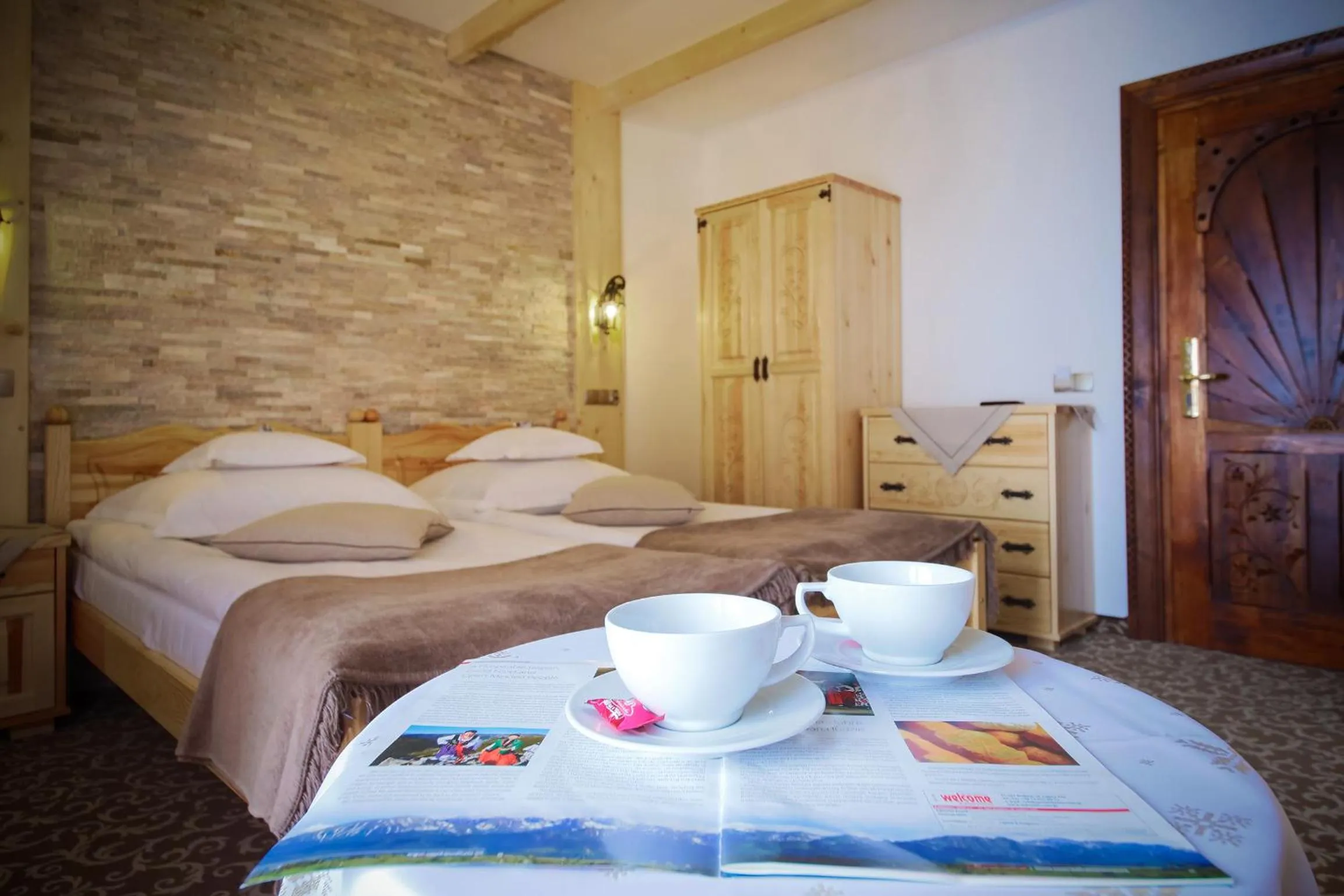 Seating area, Bed in ECO Willa Grand Karpatia Ski&Wellness