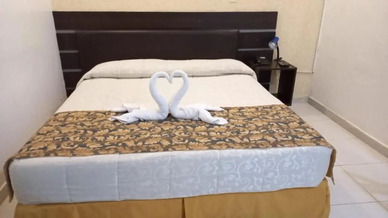 Bed in SBS Hotel & Spa