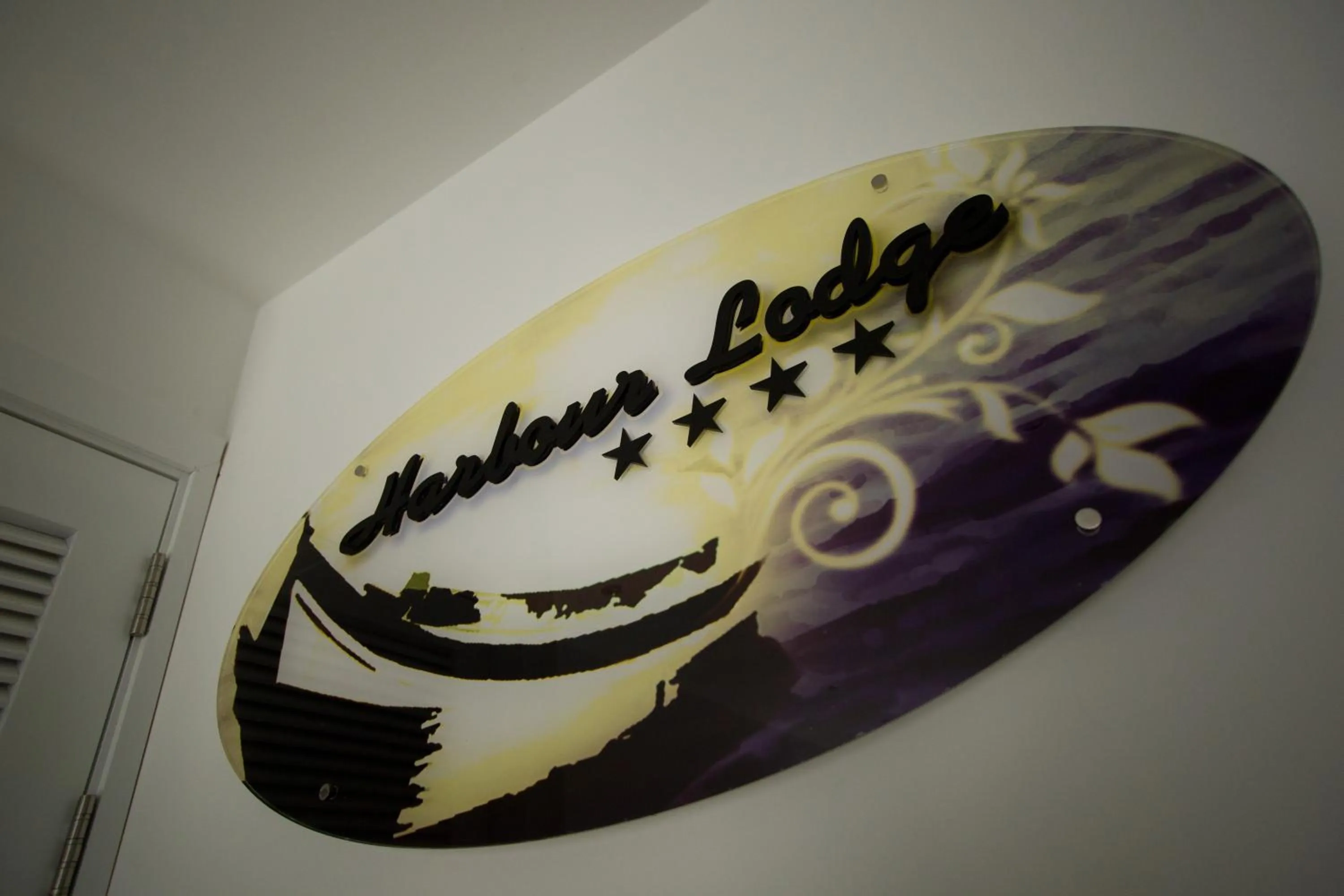 Property logo or sign in Harbour Lodge