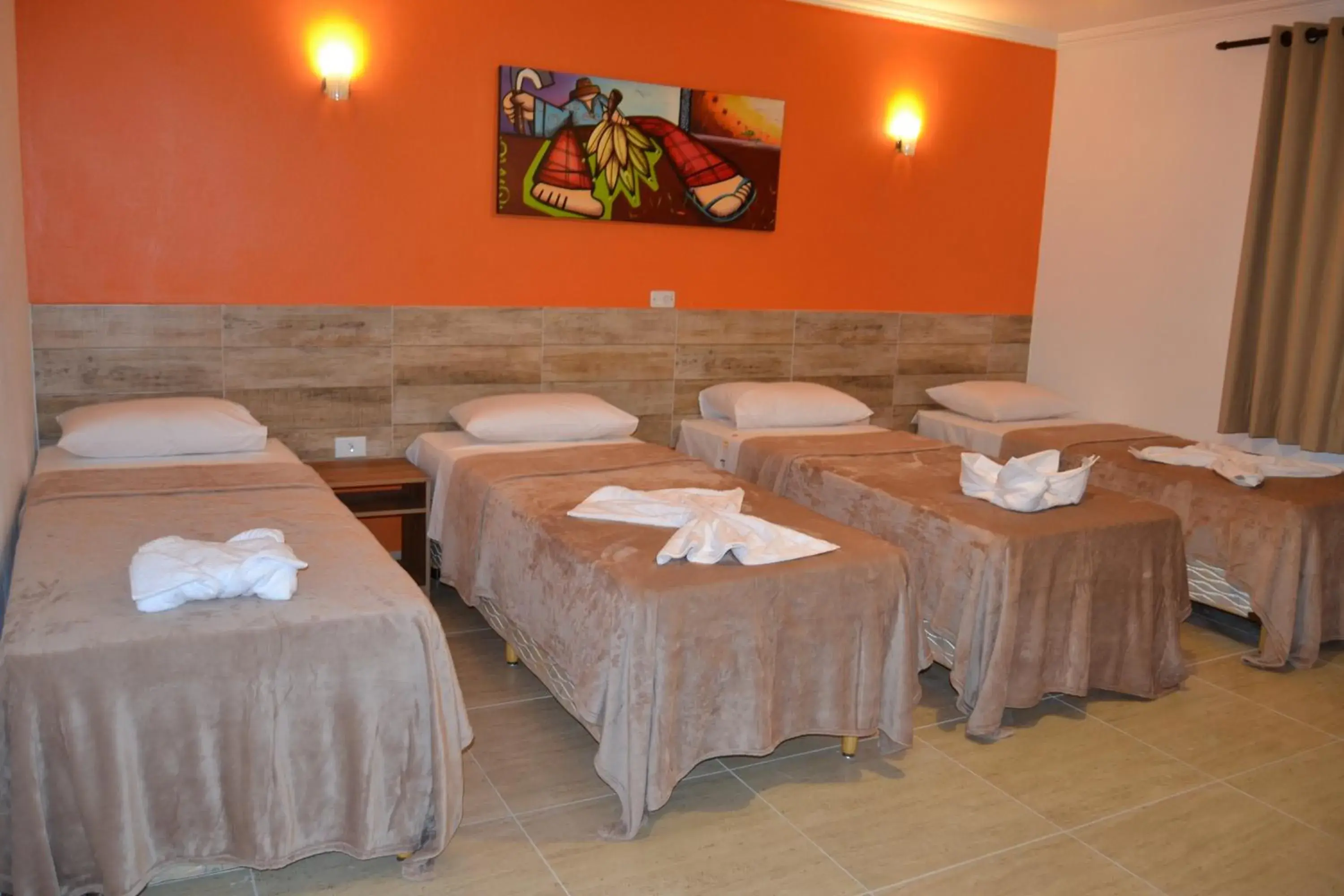 Triple Room in Pousada Beija Flores Triple Room in Pousada Beija Flores