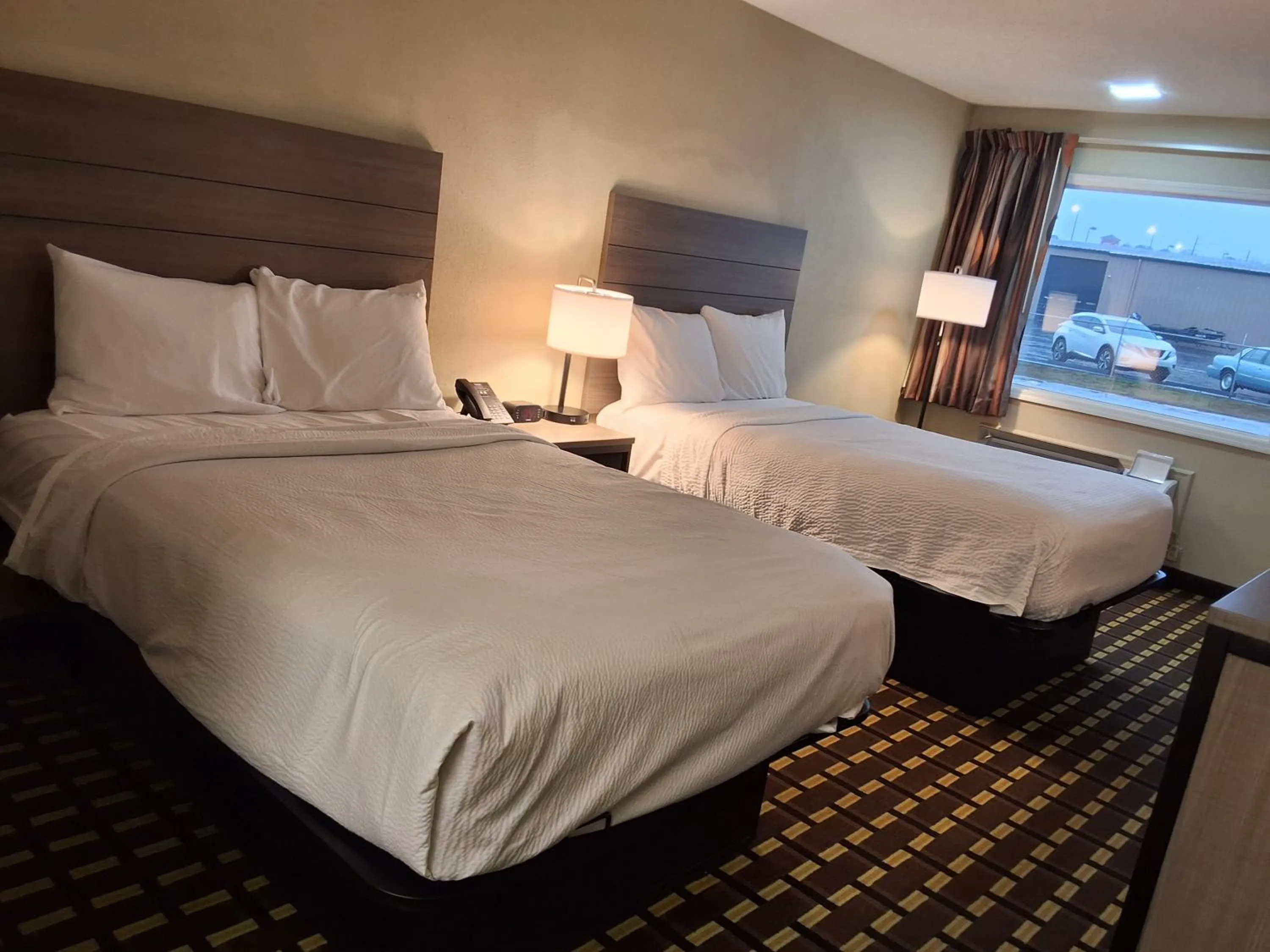 Bed in Travelodge by Wyndham-Thomasville AL
