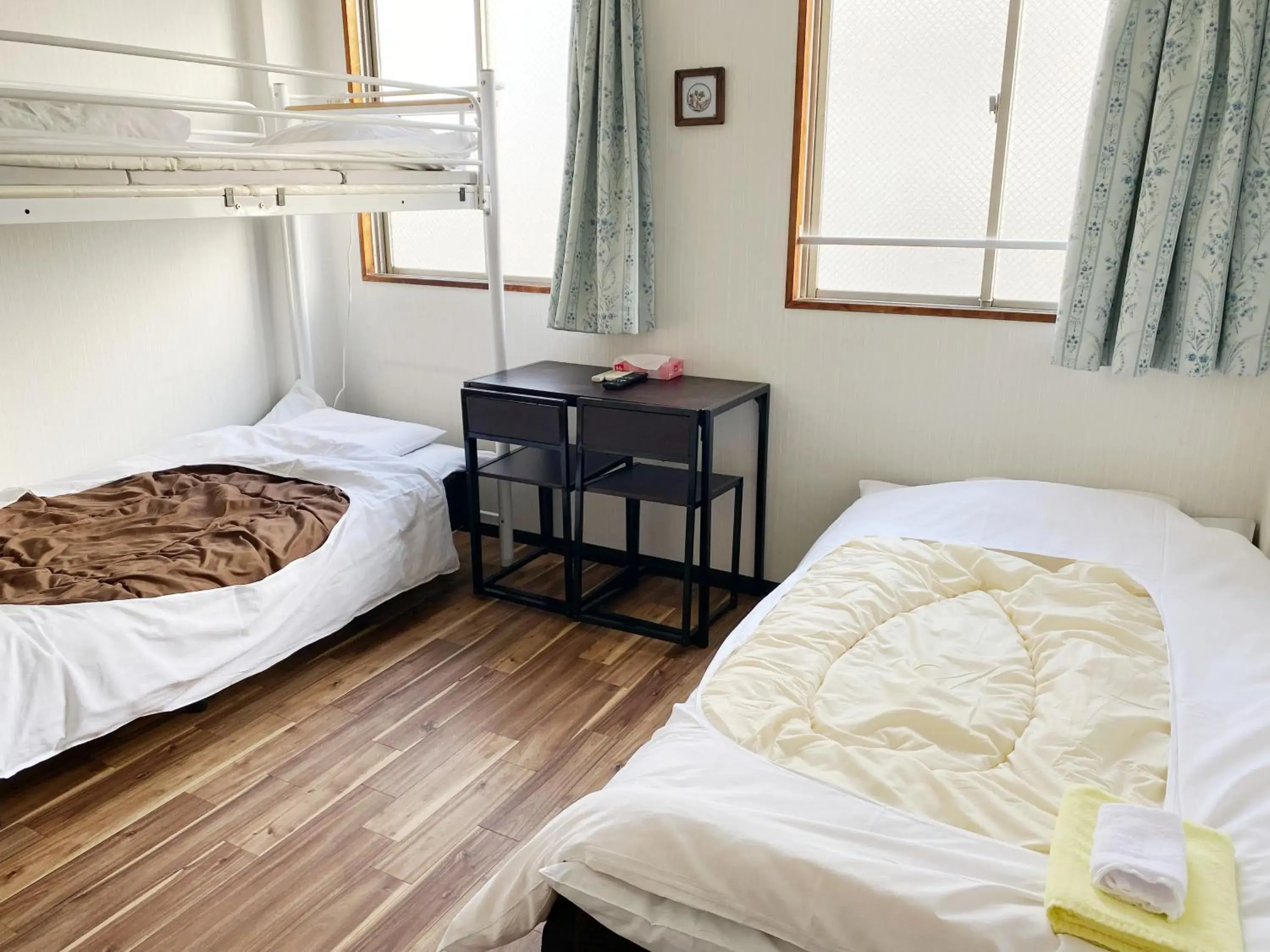 Economy Triple Room with Shared Bathroom in Hotel Mikado Economy Triple Room with Shared Bathroom in Hotel Mikado