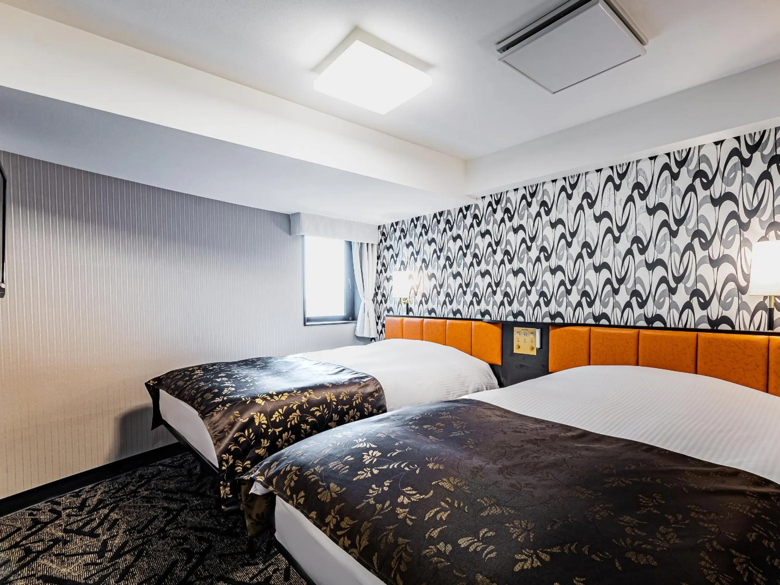 Photo of the whole room, Bed in APA Hotel Sapporo Hosui Susukino Ekimae
