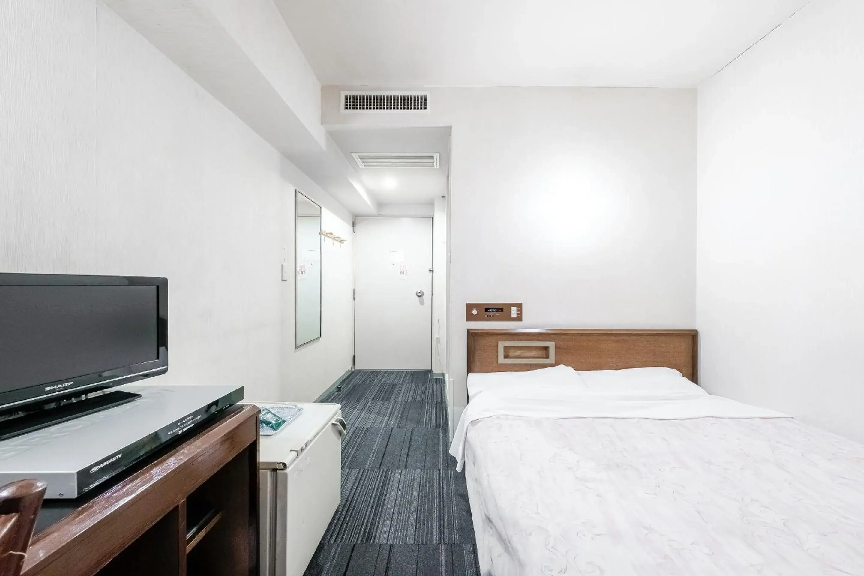 Bed in Tabist Annex Hotel Tetora Hakodate Bed in Tabist Annex Hotel Tetora Hakodate