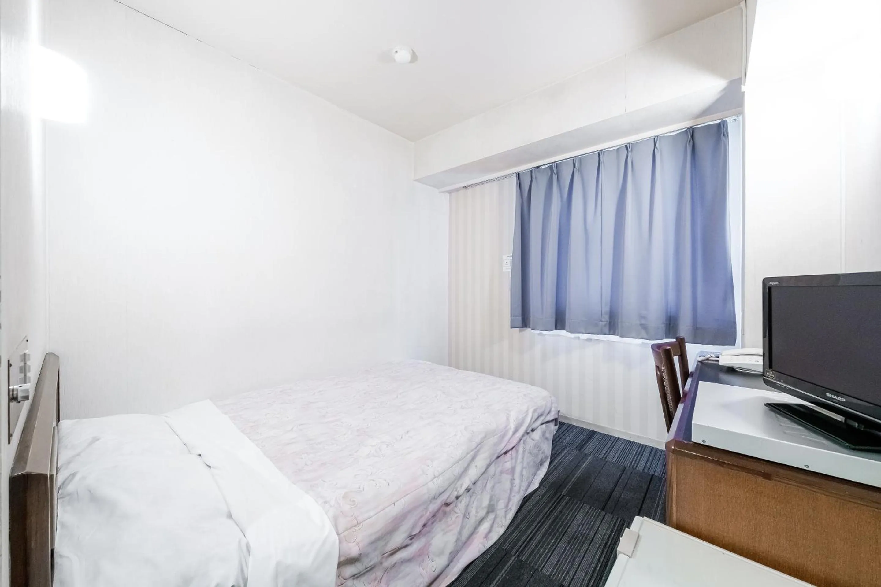 Bed in Tabist Annex Hotel Tetora Hakodate