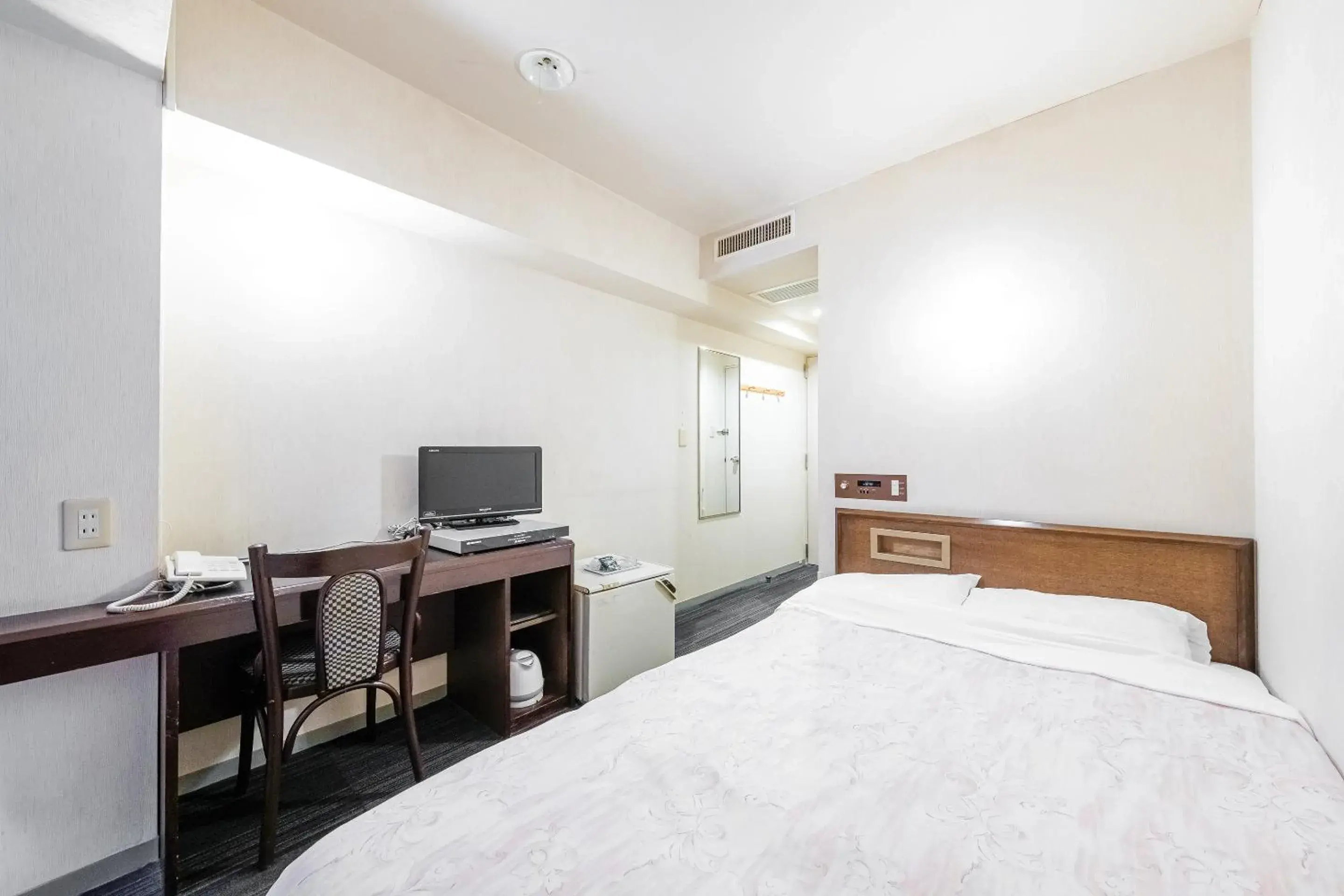 Bed in Tabist Annex Hotel Tetora Hakodate Bed in Tabist Annex Hotel Tetora Hakodate