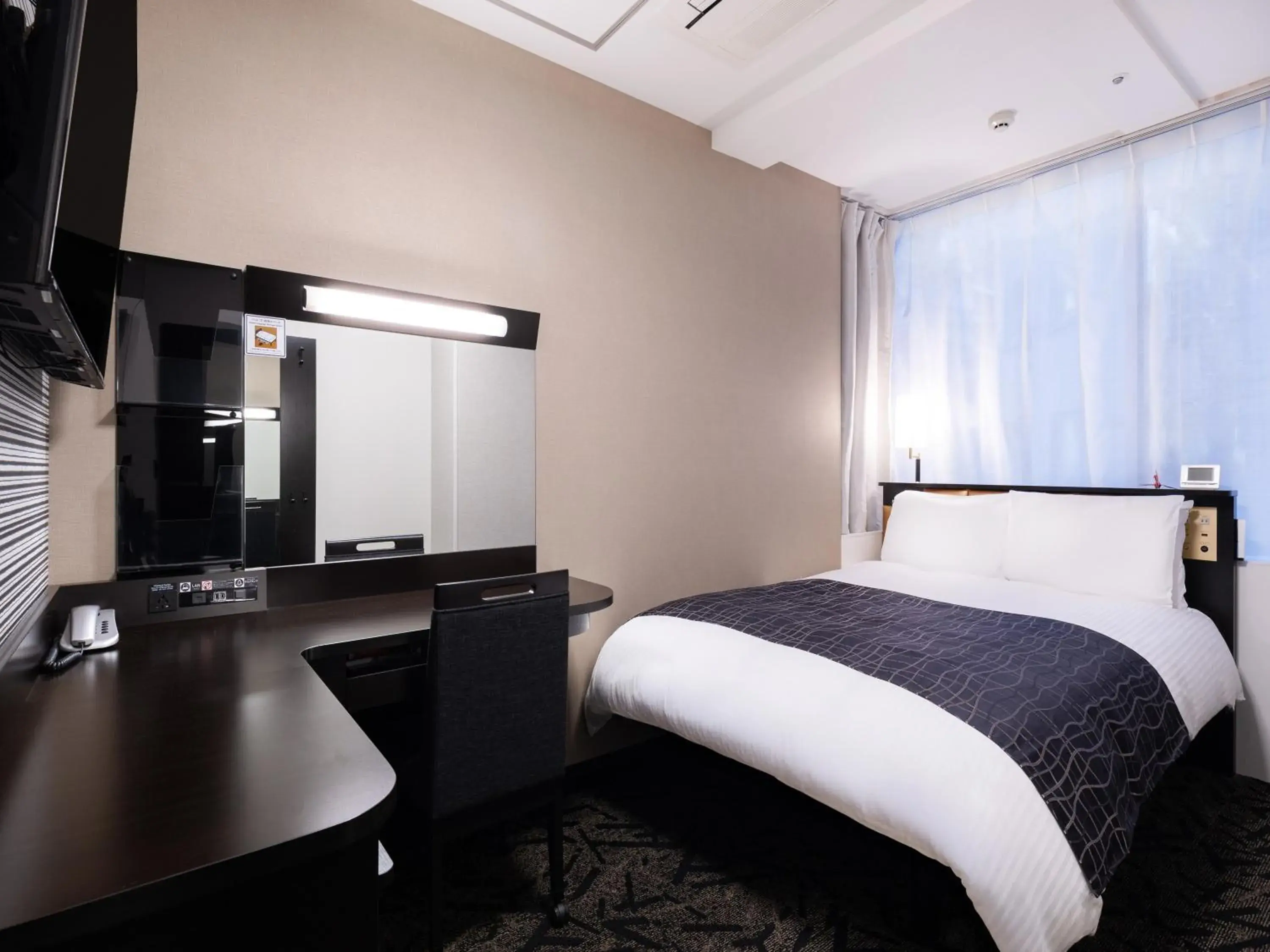 Photo of the whole room, Bed in APA Hotel Osaka Tanimachi 4chome Ekimae Kita Photo of the whole room, Bed in APA Hotel Osaka Tanimachi 4chome Ekimae Kita