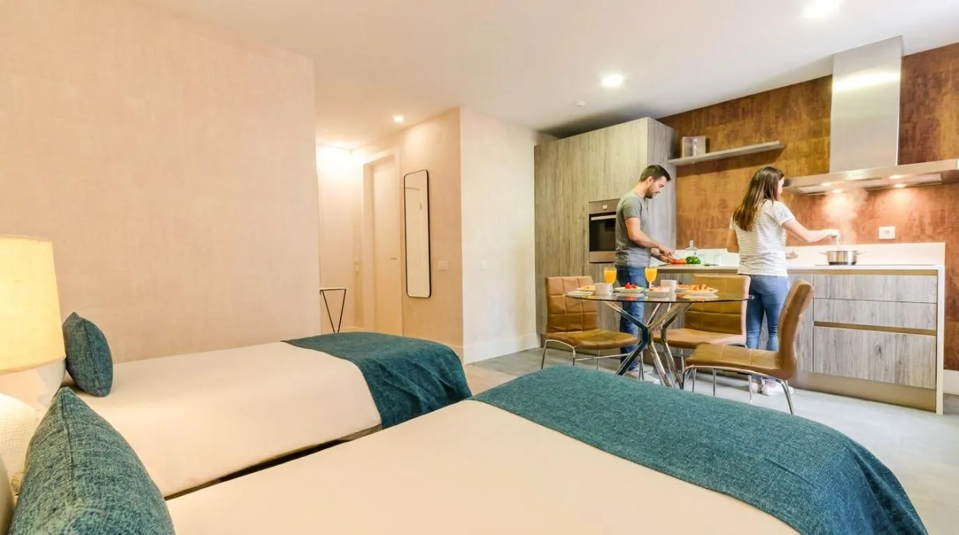 Kitchen or kitchenette, Bed in LX51 Studios & Suites by APT IIN - Lisbon Center