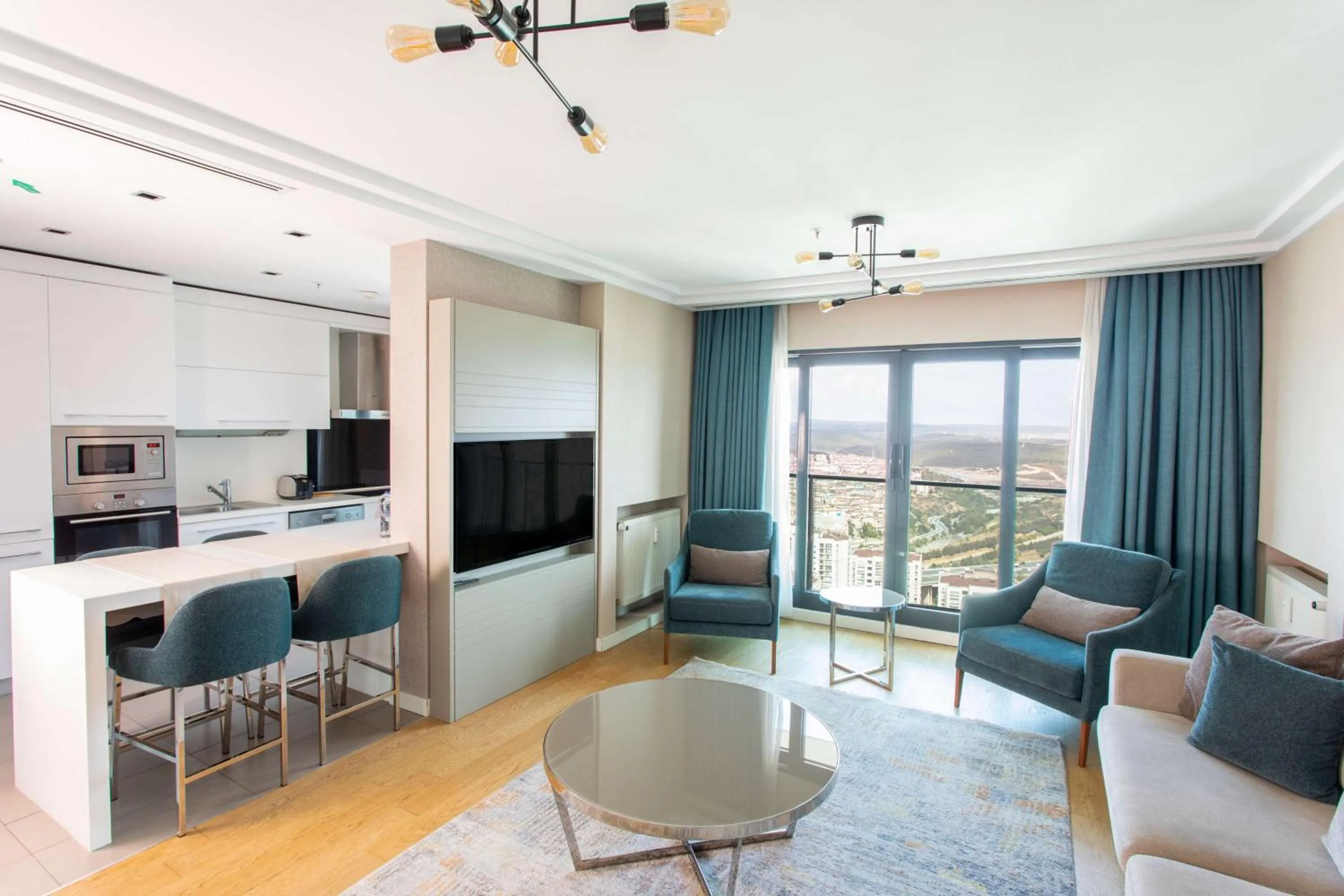 Communal lounge/ TV room in Radisson Residences Avrupa TEM Istanbul