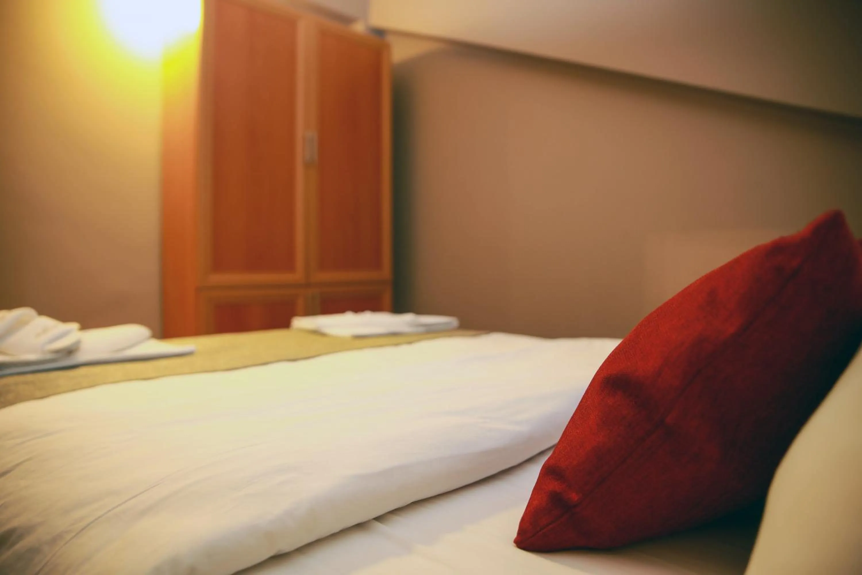 Bedroom in Akin Suites