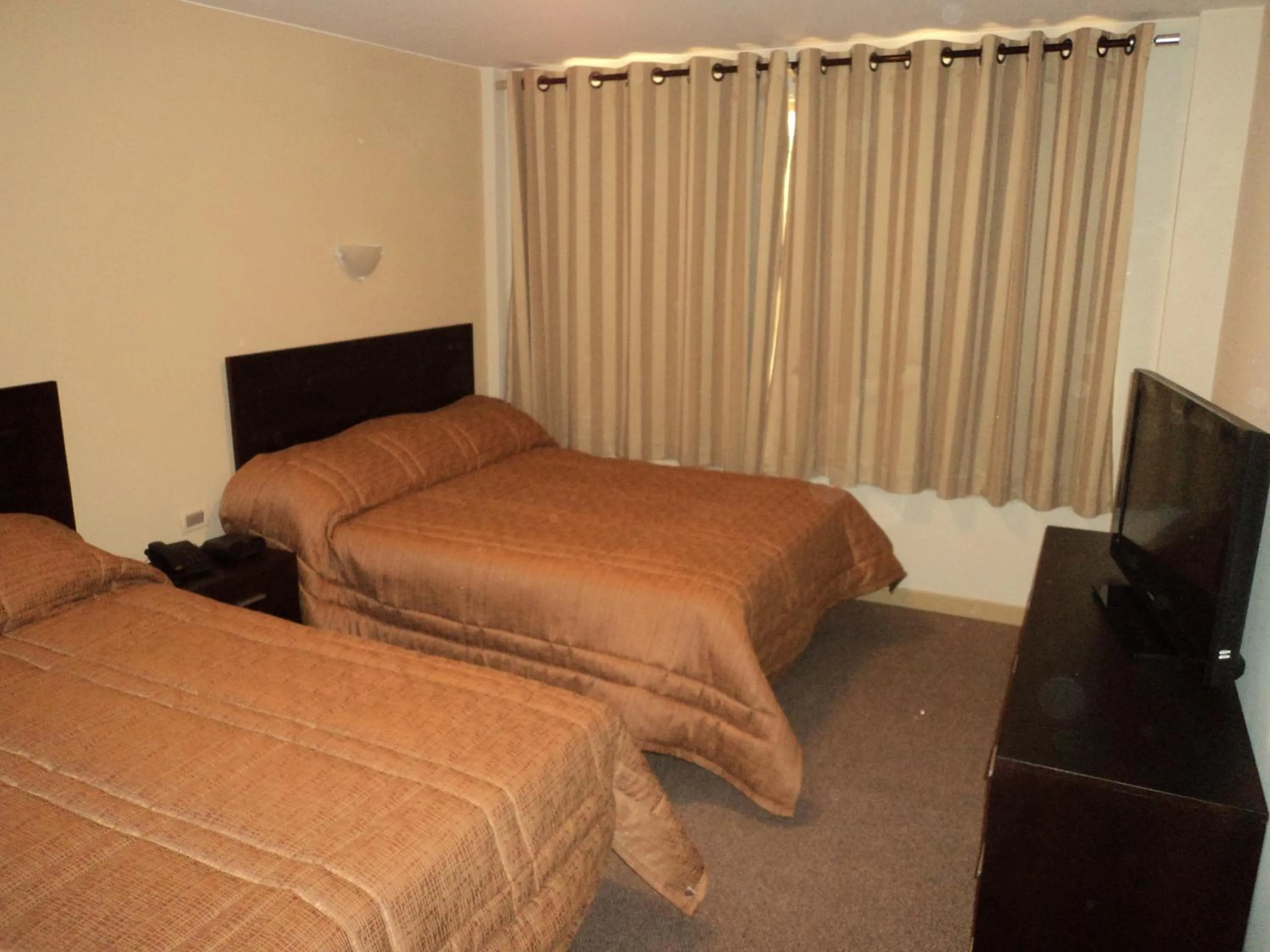 Bed in Los Sauces Apart Hotel