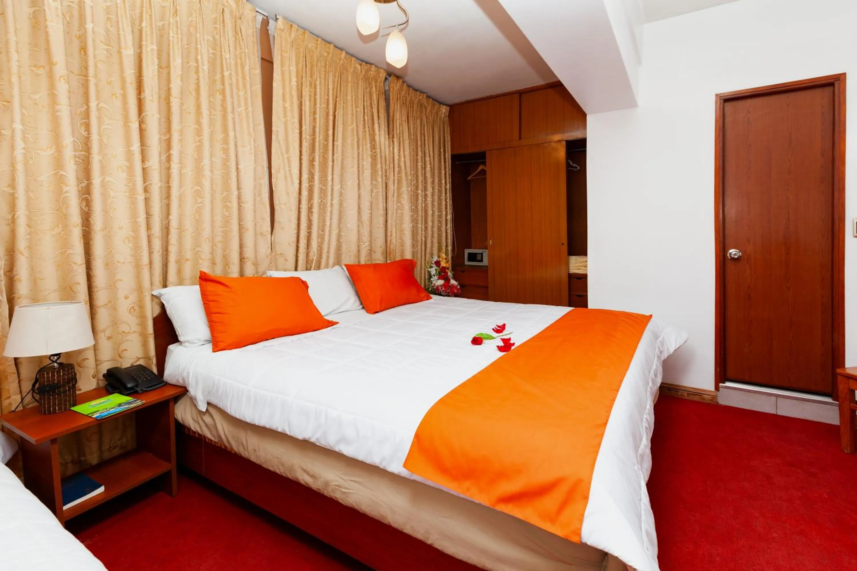 Bed in Hotel Sol del Oriente Cusco