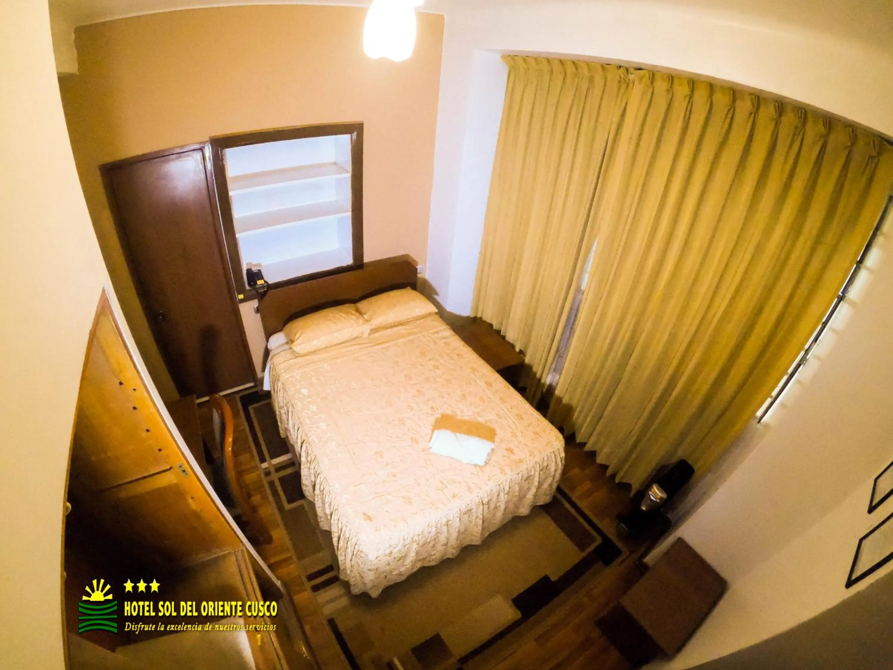 Bed in Hotel Sol del Oriente Cusco