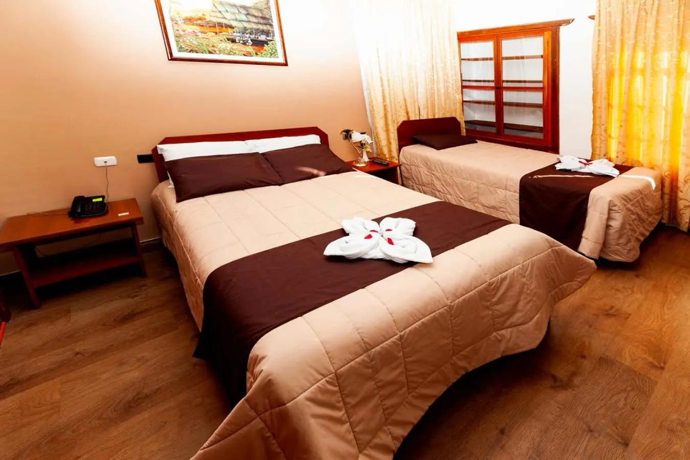 Bed in Hotel Sol del Oriente Cusco