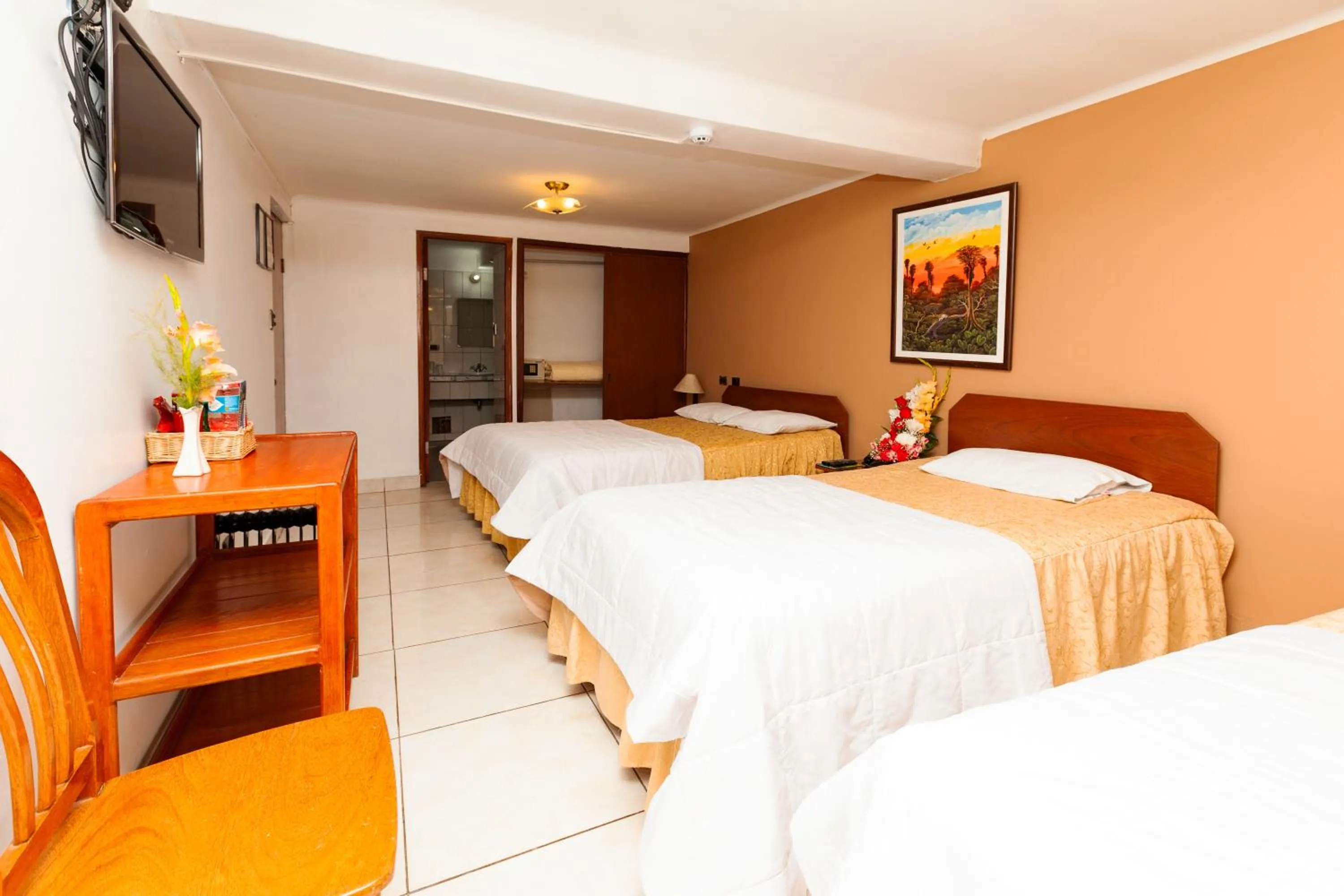 Bed in Hotel Sol del Oriente Cusco