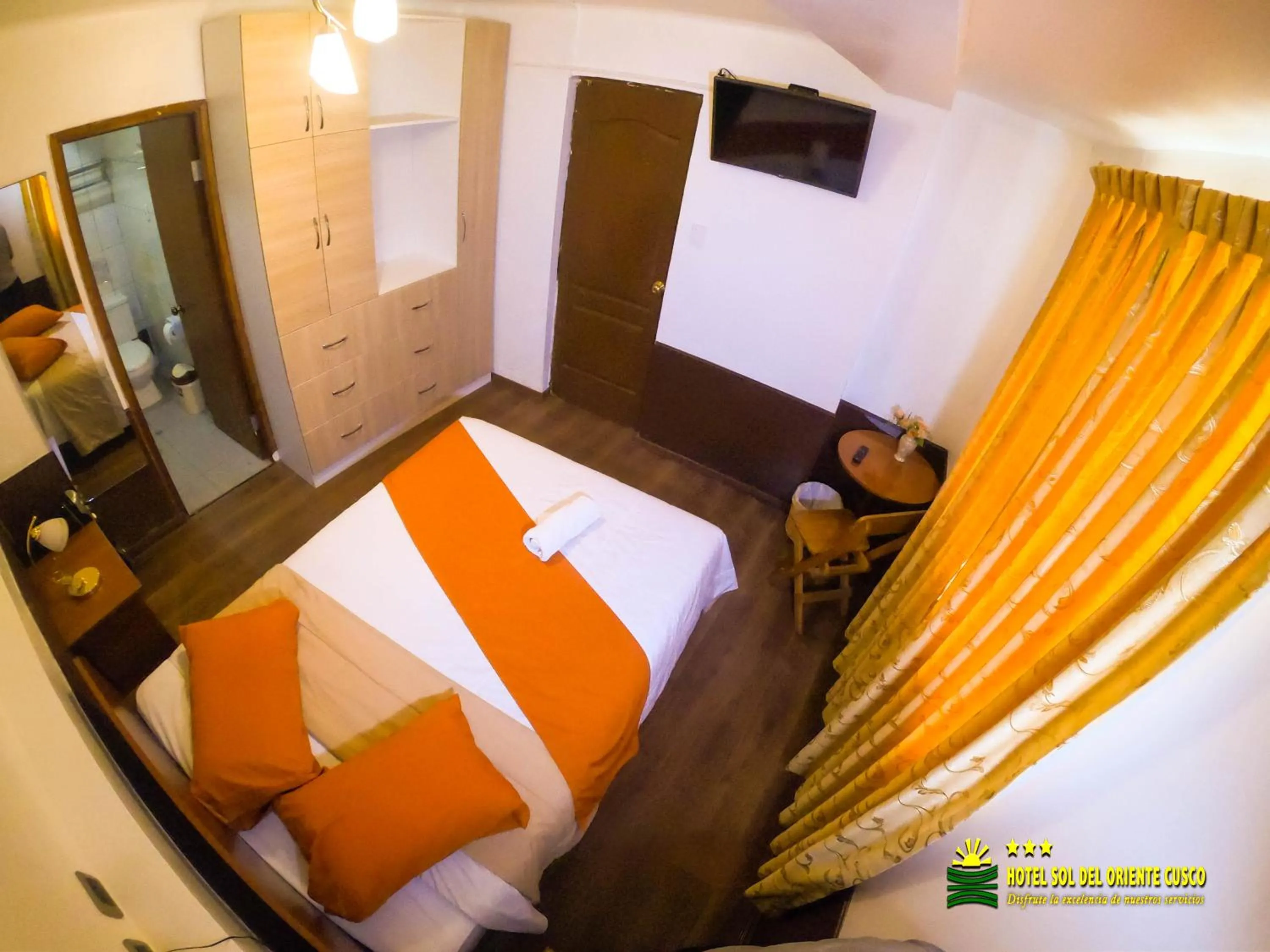 Bed in Hotel Sol del Oriente Cusco