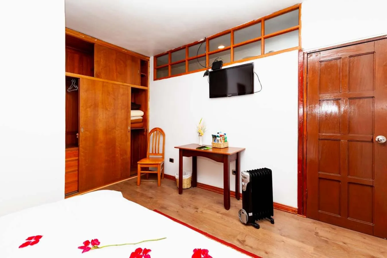 Bed in Hotel Sol del Oriente Cusco