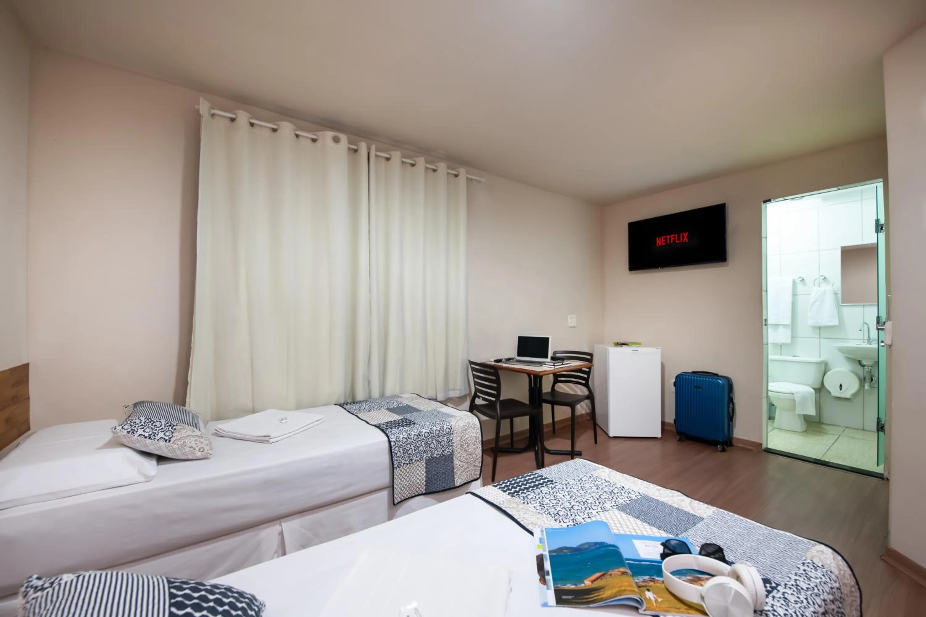 Bed in Hotel Pouso Alegre