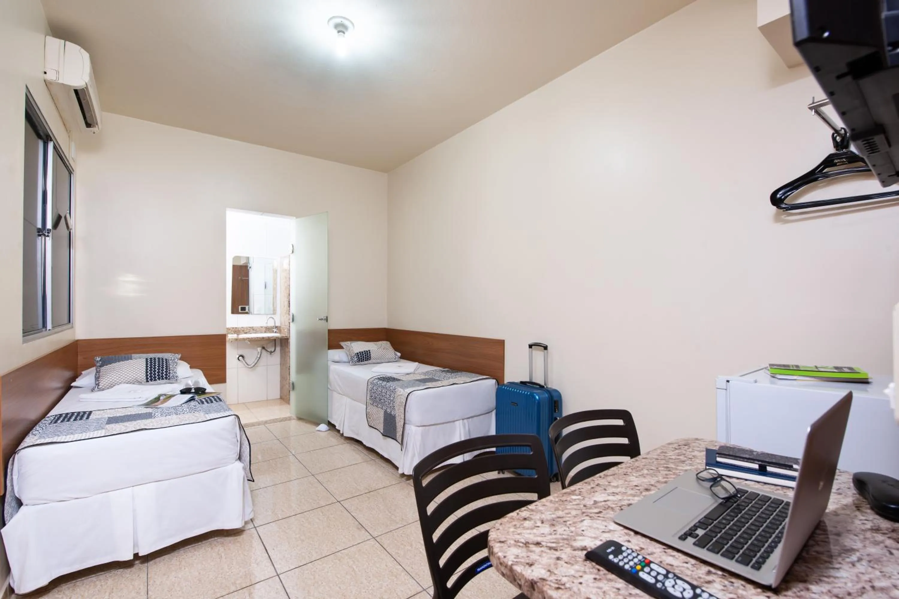 Bed in Hotel Pouso Alegre