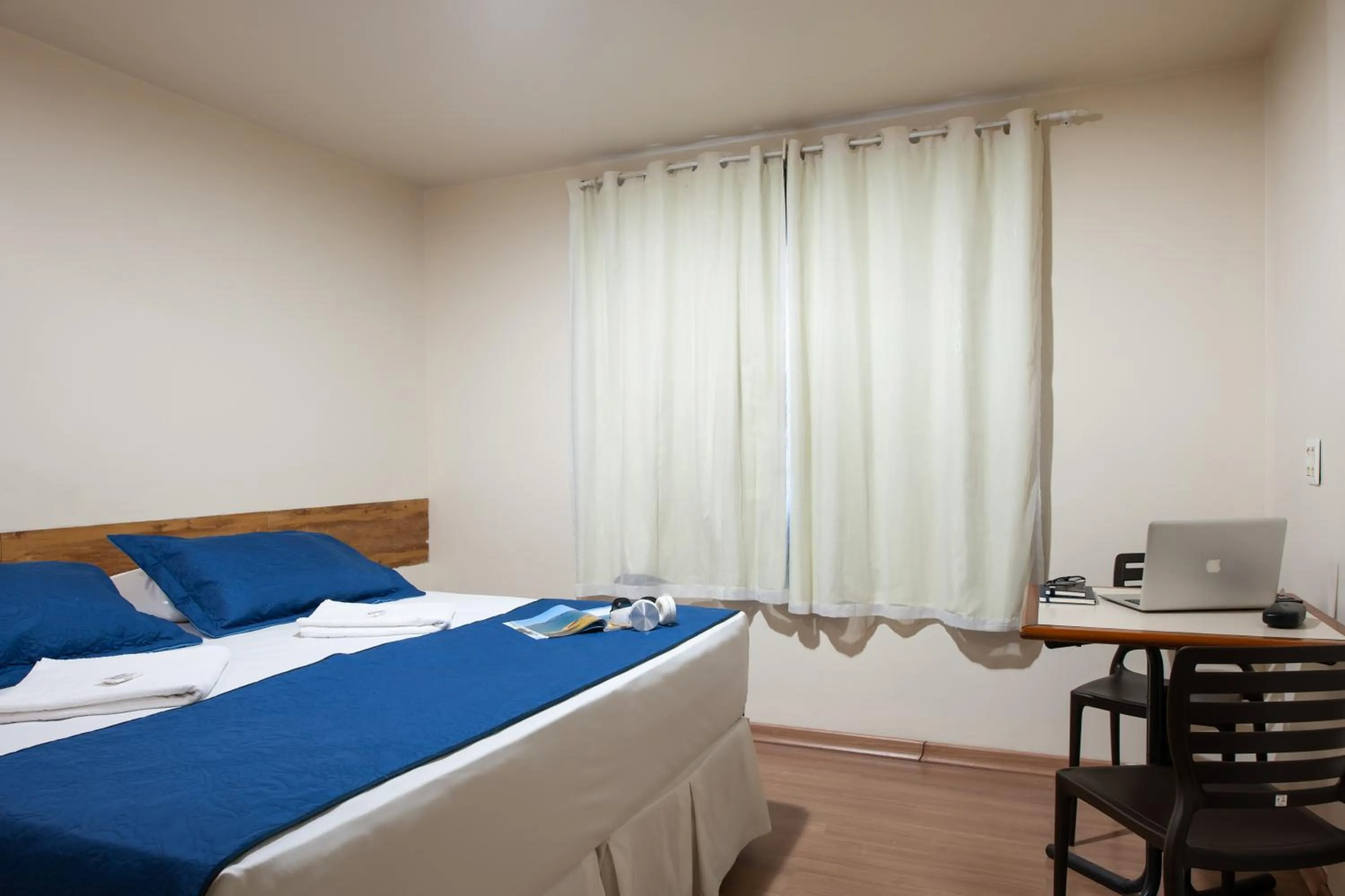 Bed in Hotel Pouso Alegre