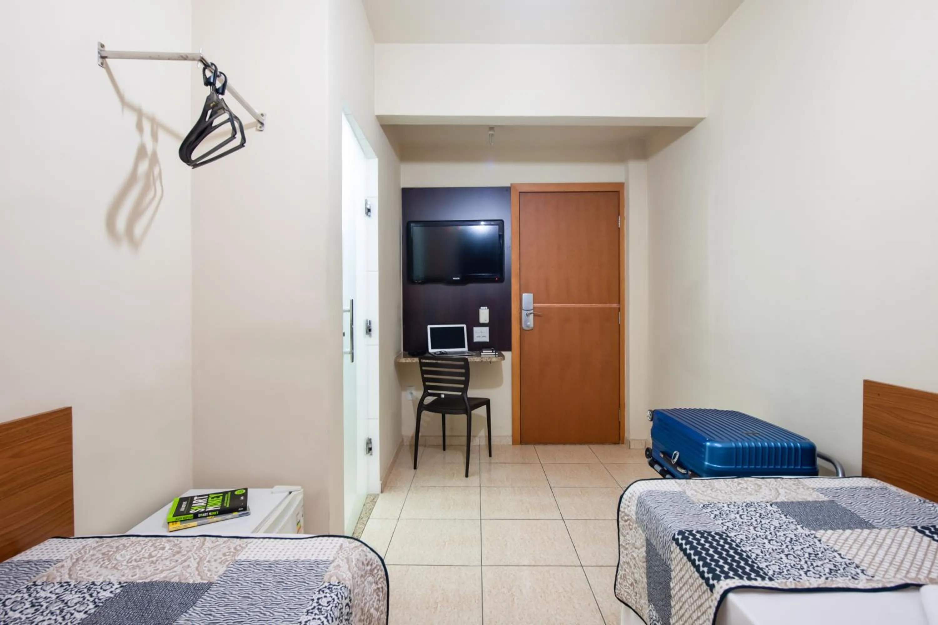 Bed in Hotel Pouso Alegre