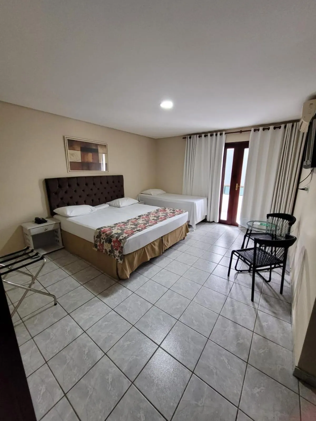 Bed in Hotel Três Palmeiras