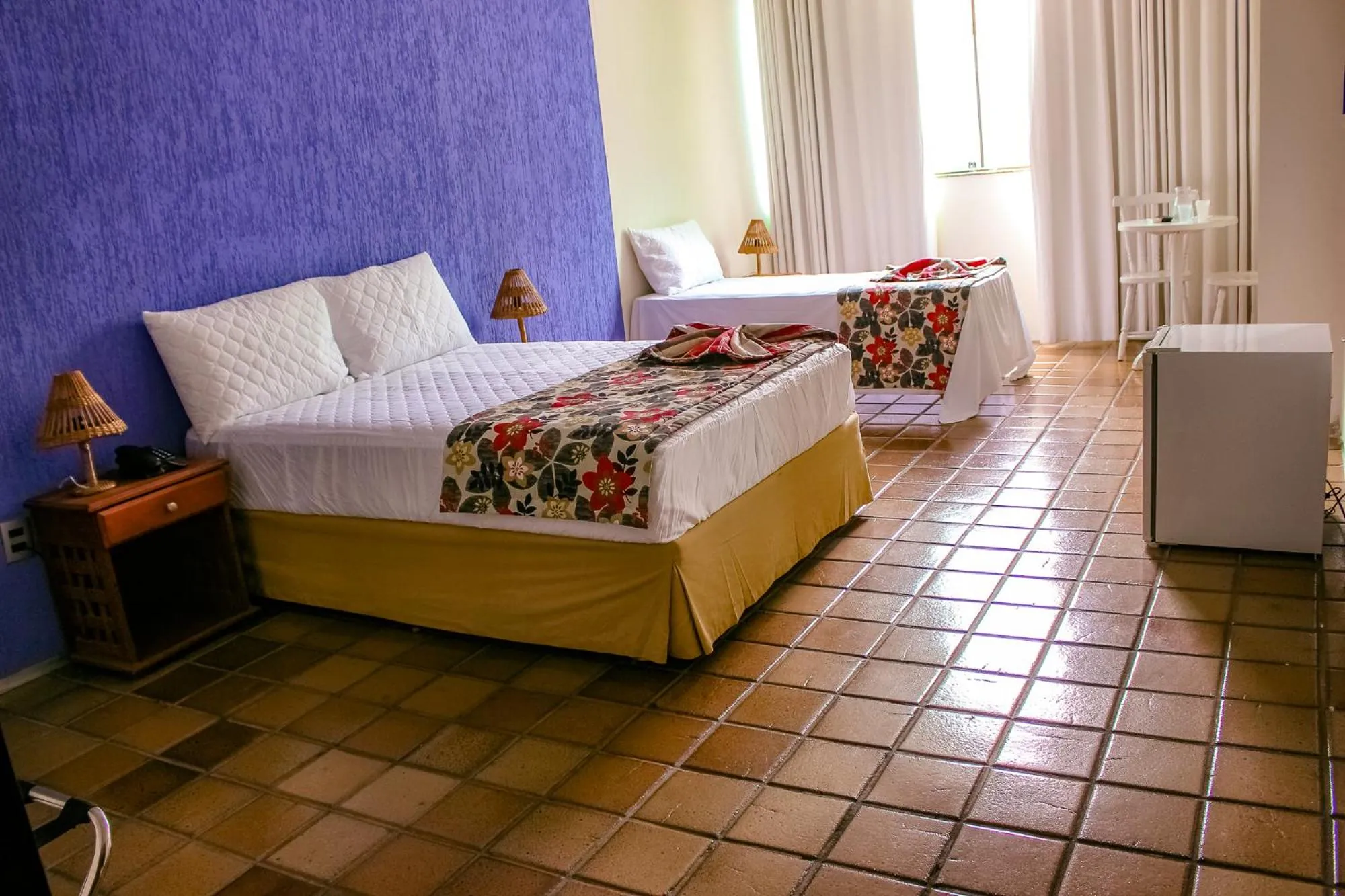 Bed in Hotel Três Palmeiras