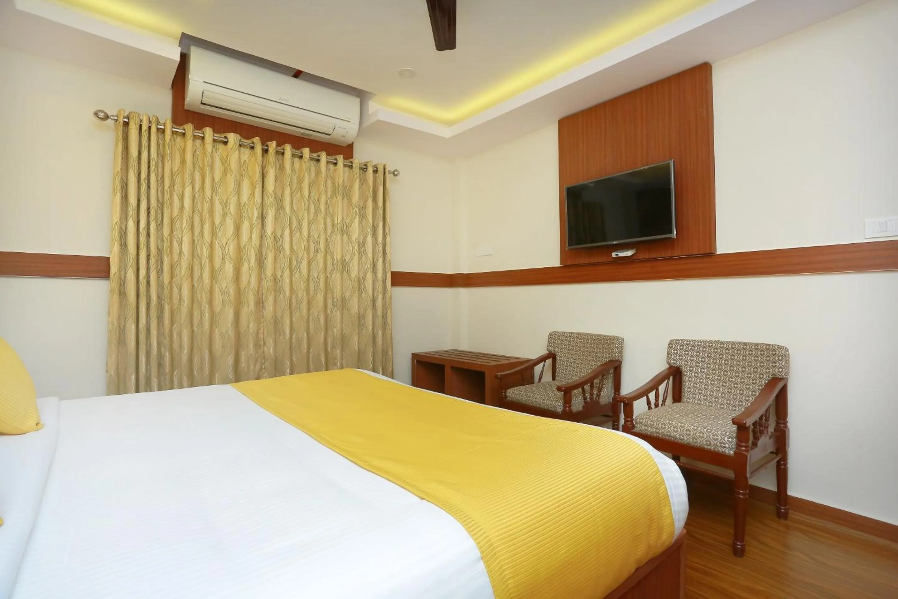 Bedroom, Bed in Super Capital O Kovilakam Residency
