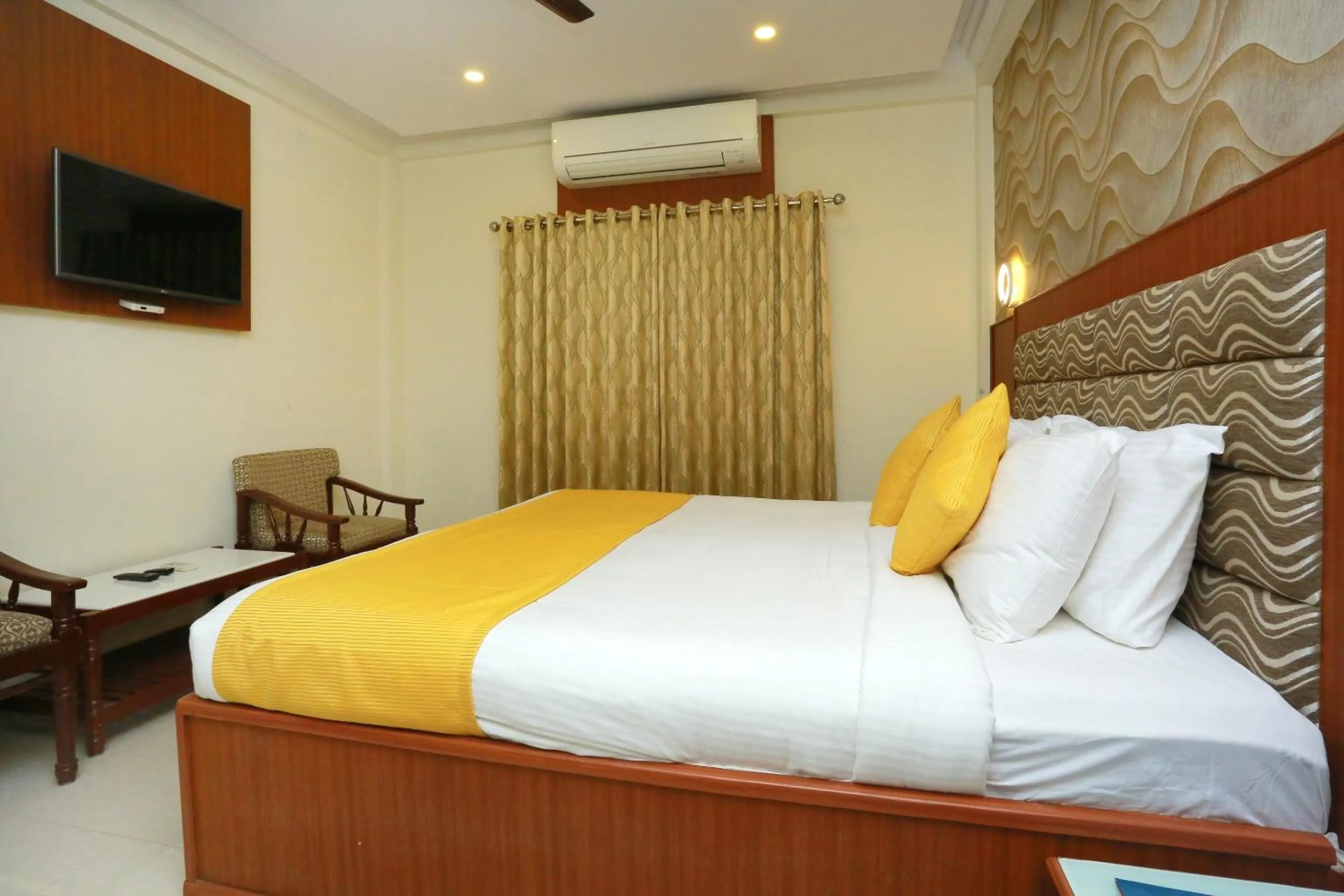Bedroom, Bed in Super Capital O Kovilakam Residency