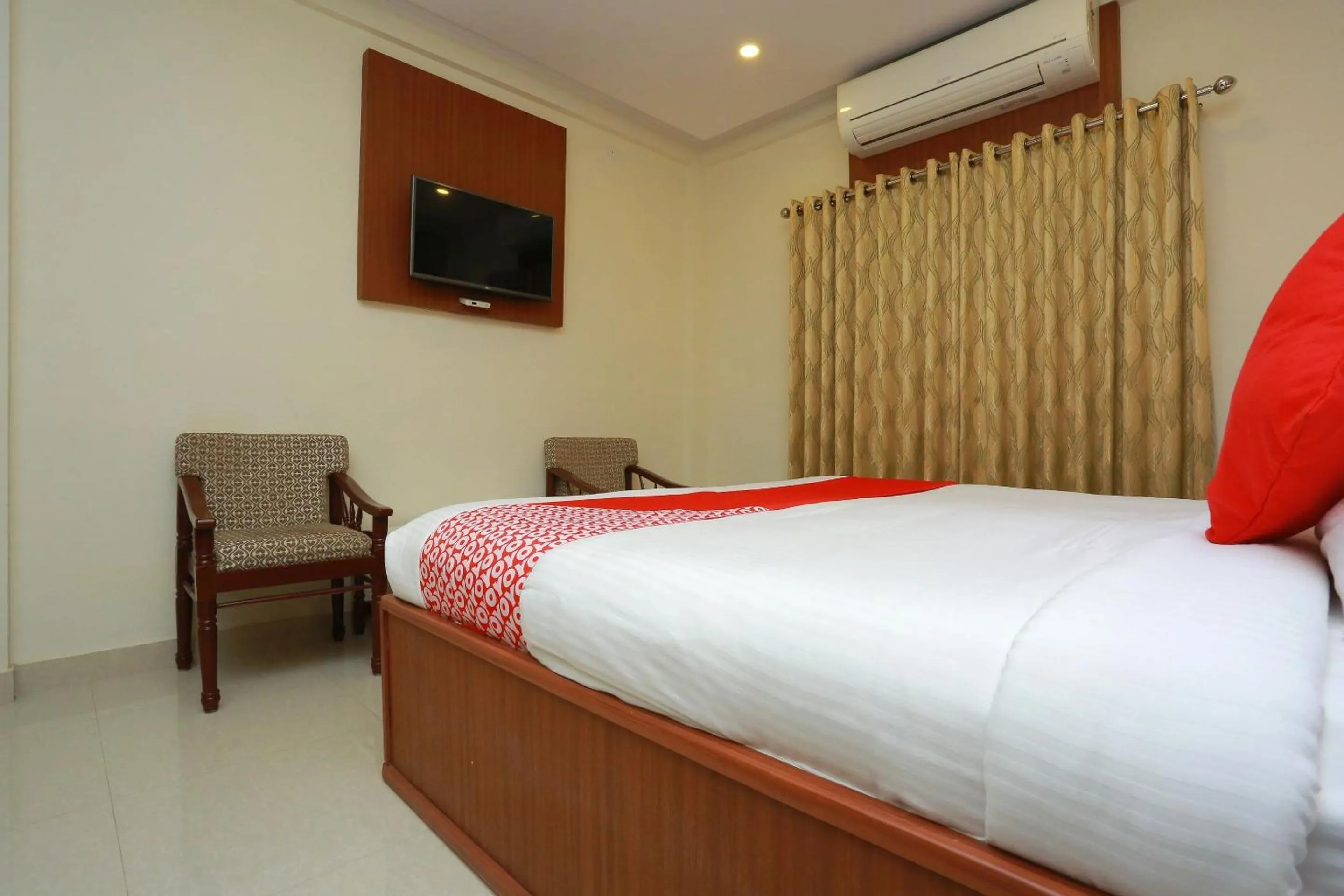 Bedroom, Bed in Super Capital O Kovilakam Residency
