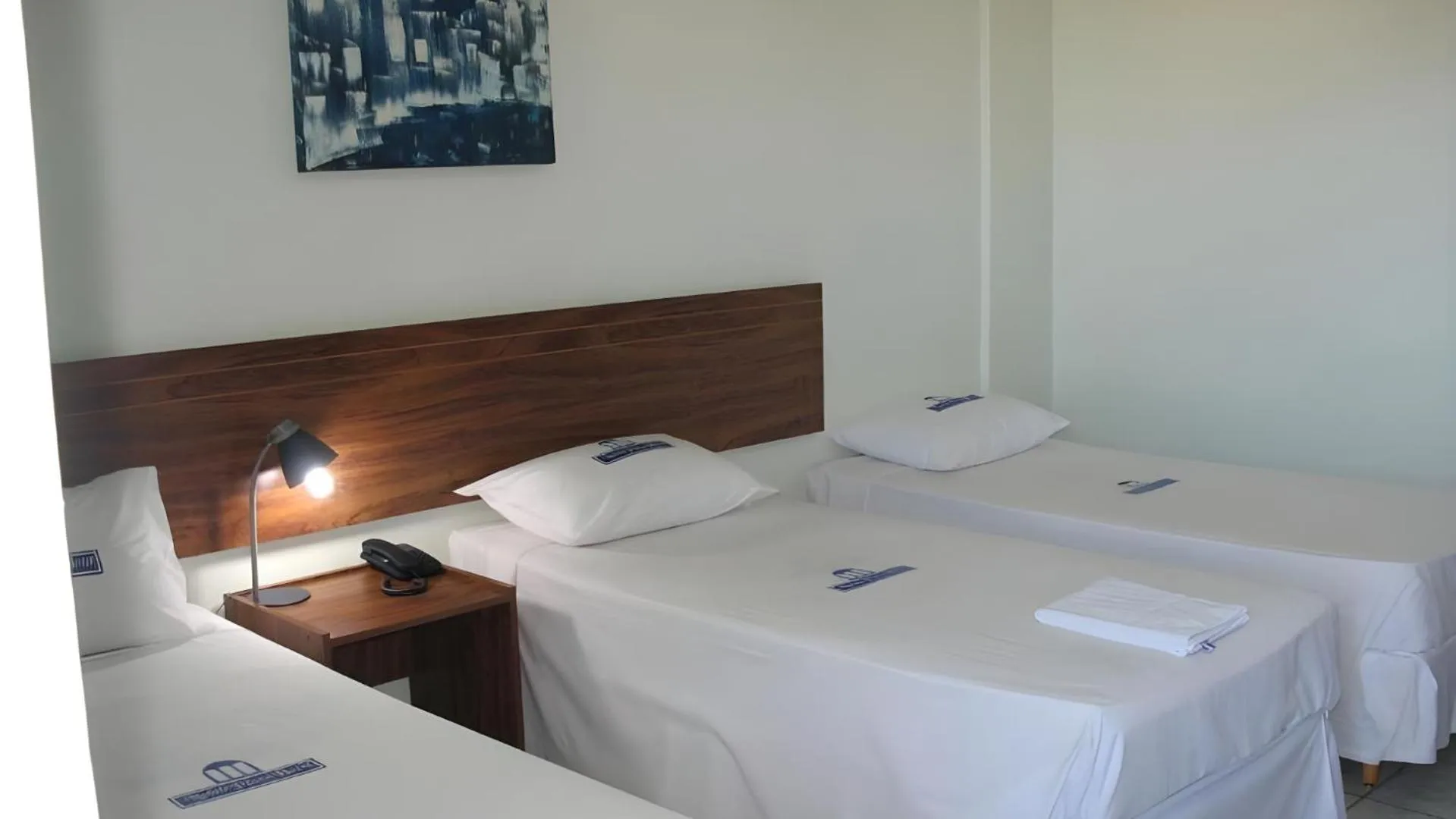 Bed in Nobile Plaza Hotel