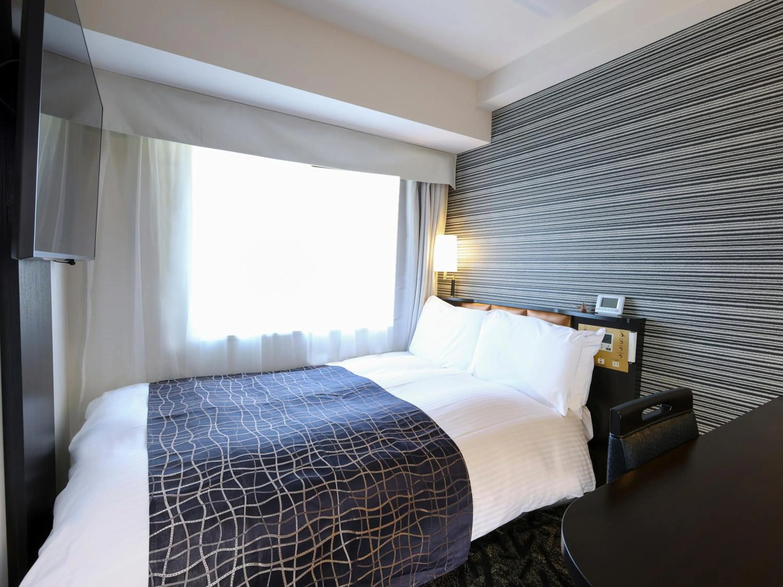 Photo of the whole room, Bed in APA Hotel Keisei Narita Ekimae