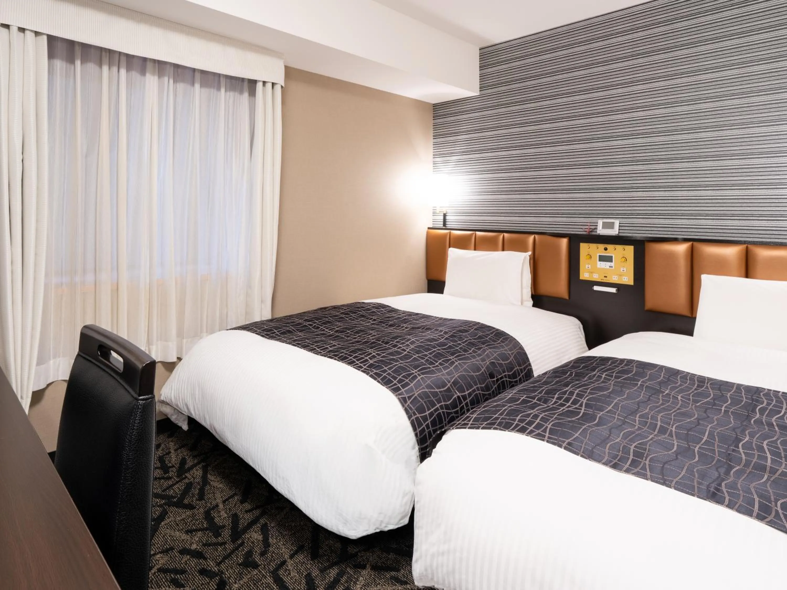 Photo of the whole room, Bed in APA Hotel Takasaki Ekimae