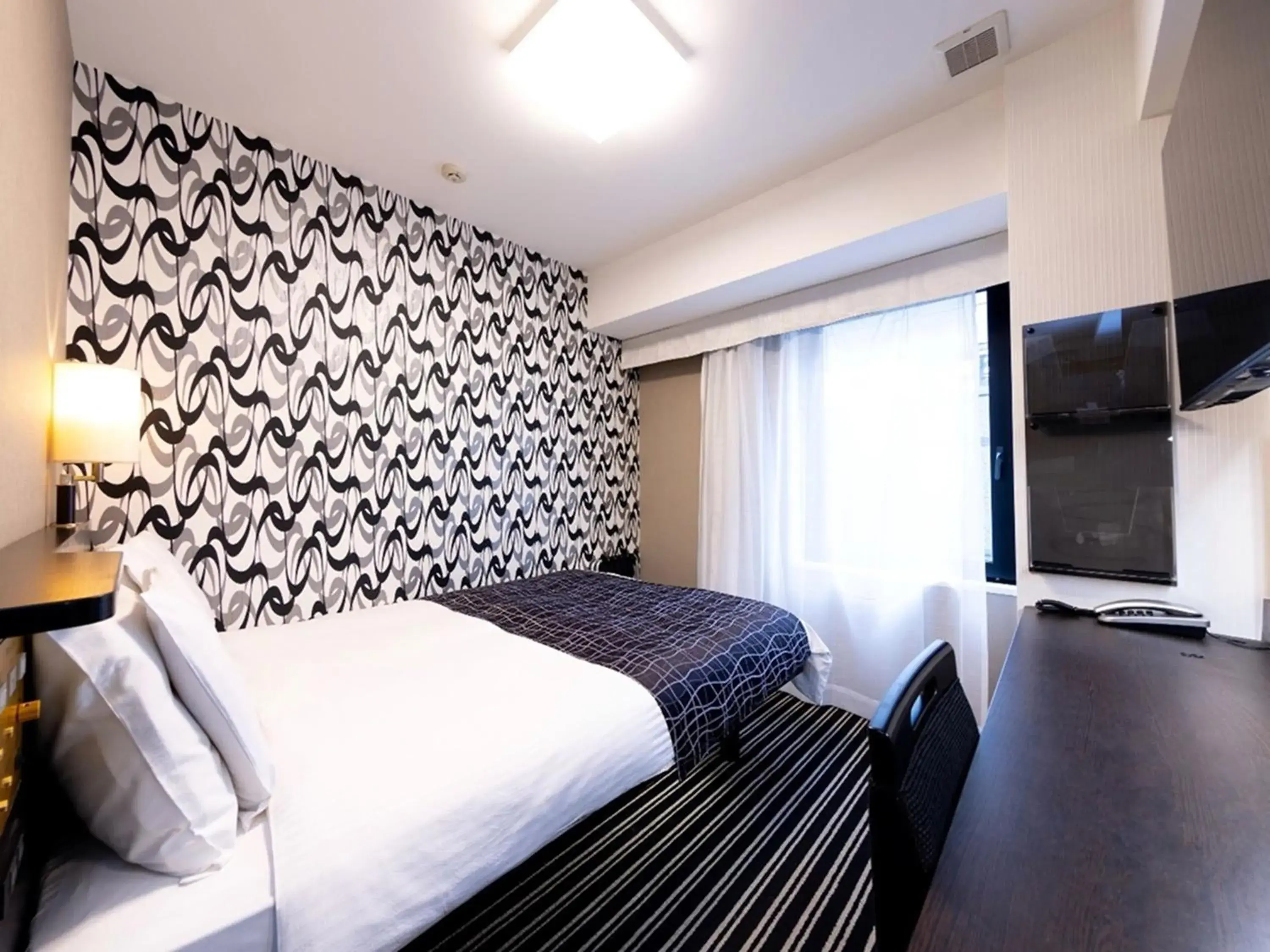 Bed in APA Hotel Tokyo Kudanshita Bed in APA Hotel Tokyo Kudanshita