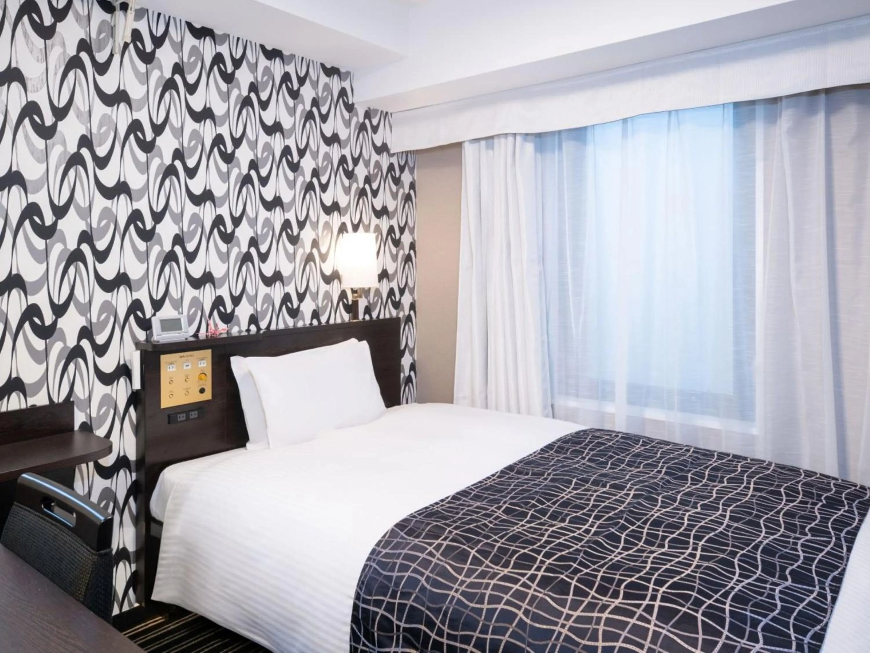 Bed in APA Hotel Tokyo Kudanshita