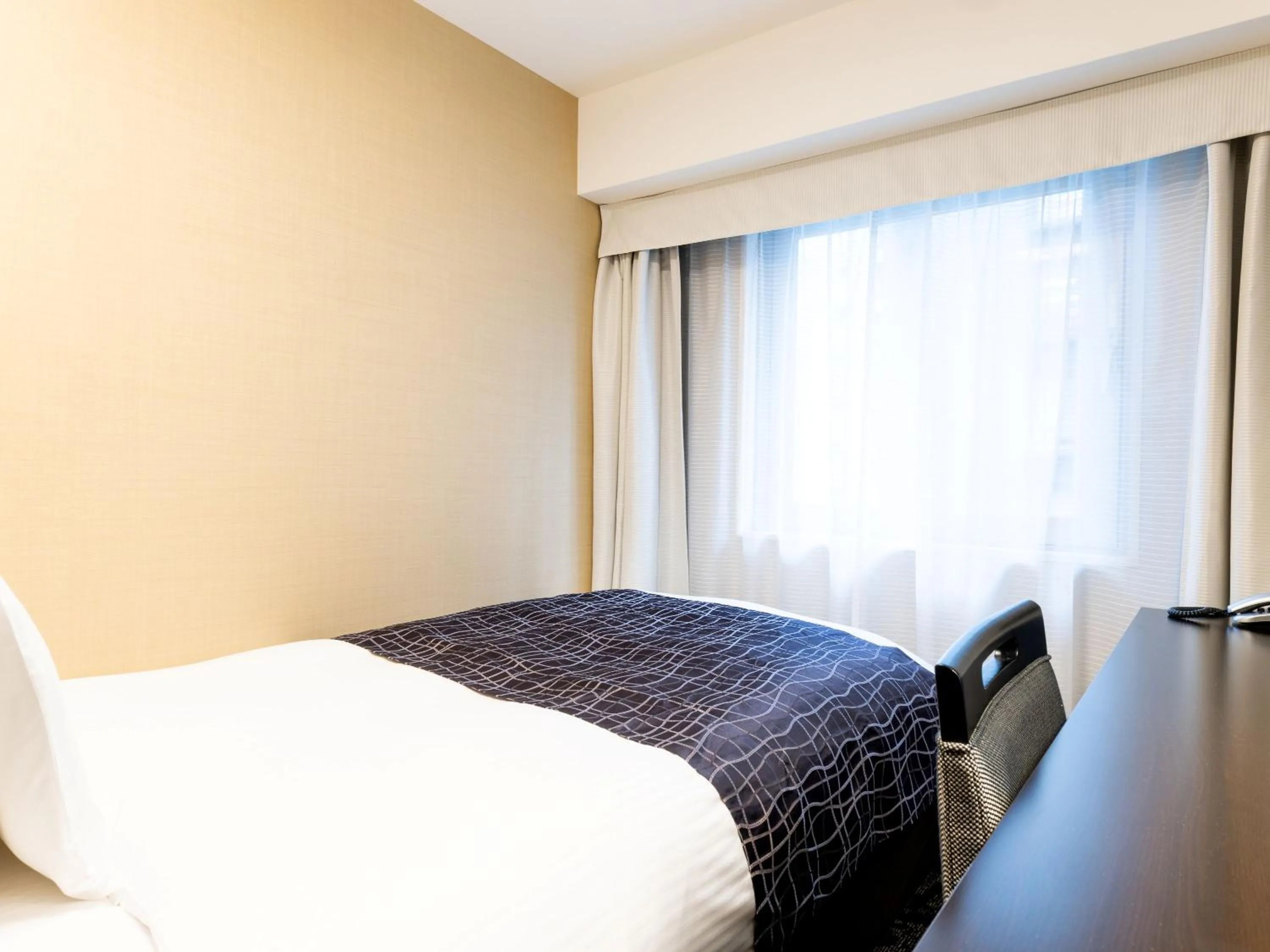 Photo of the whole room, Bed in APA Hotel Midosuji Hommachi Ekimae