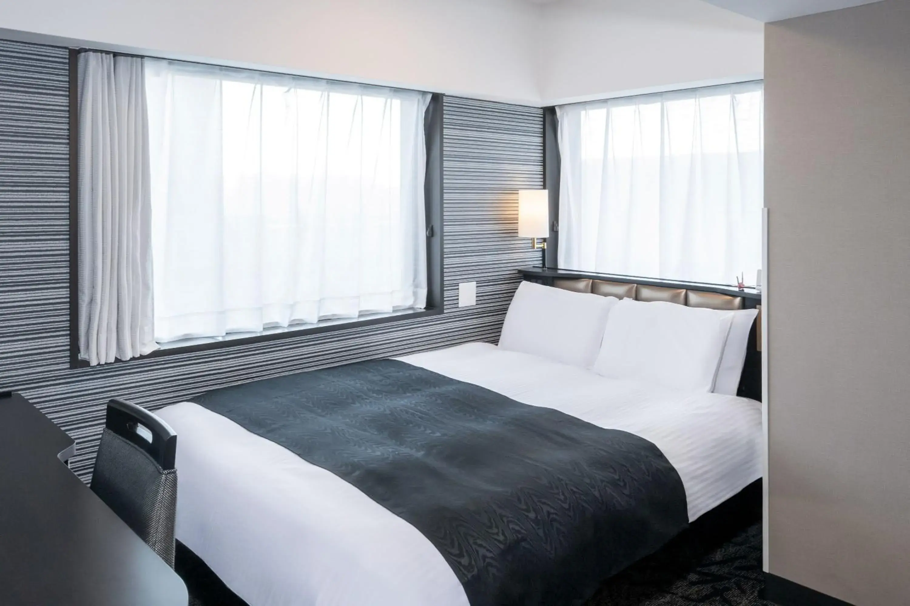 Bed in APA Hotel Tokyo Ojima Bed in APA Hotel Tokyo Ojima