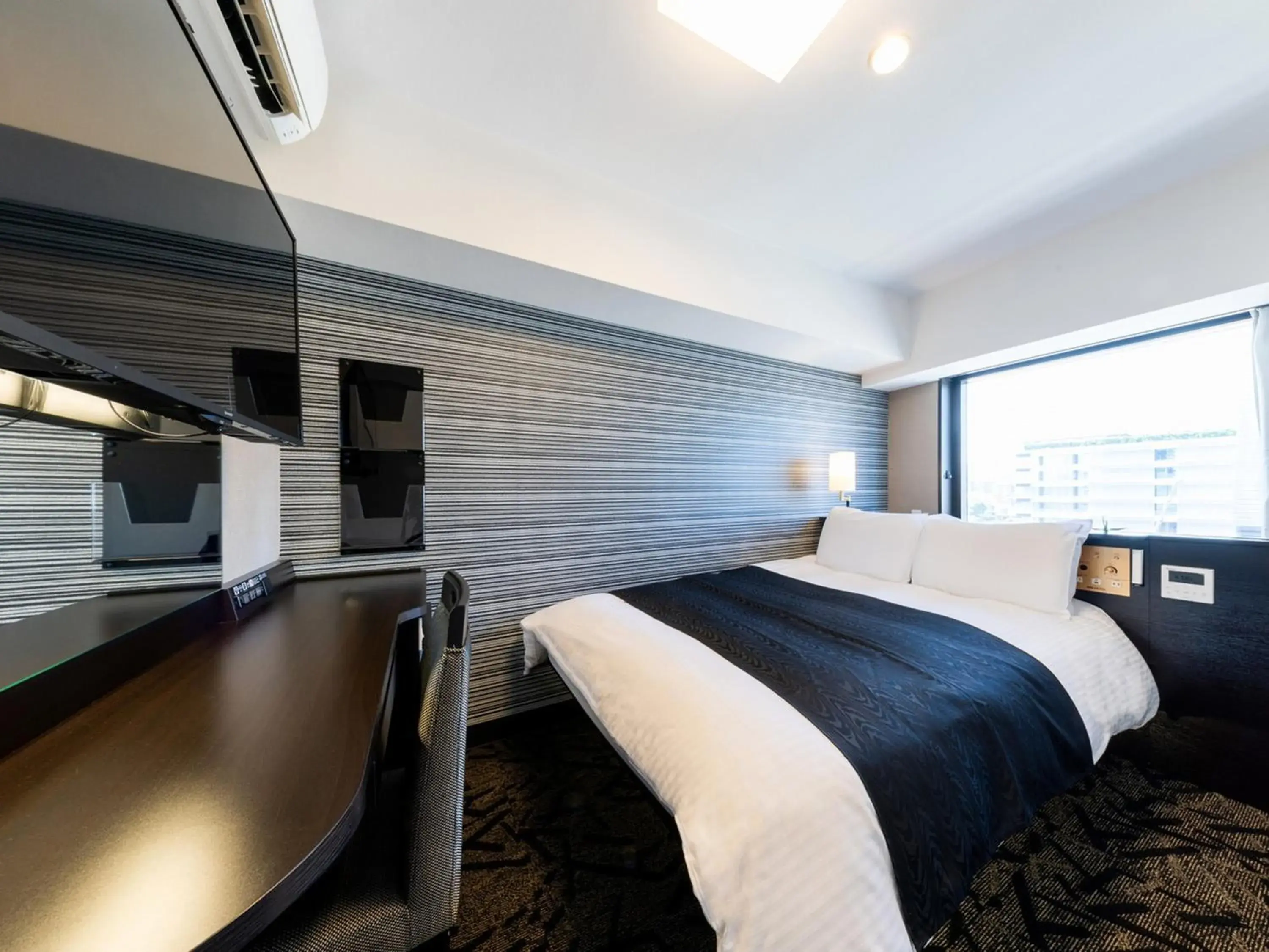 Bed in APA Hotel Tokyo Ojima Bed in APA Hotel Tokyo Ojima