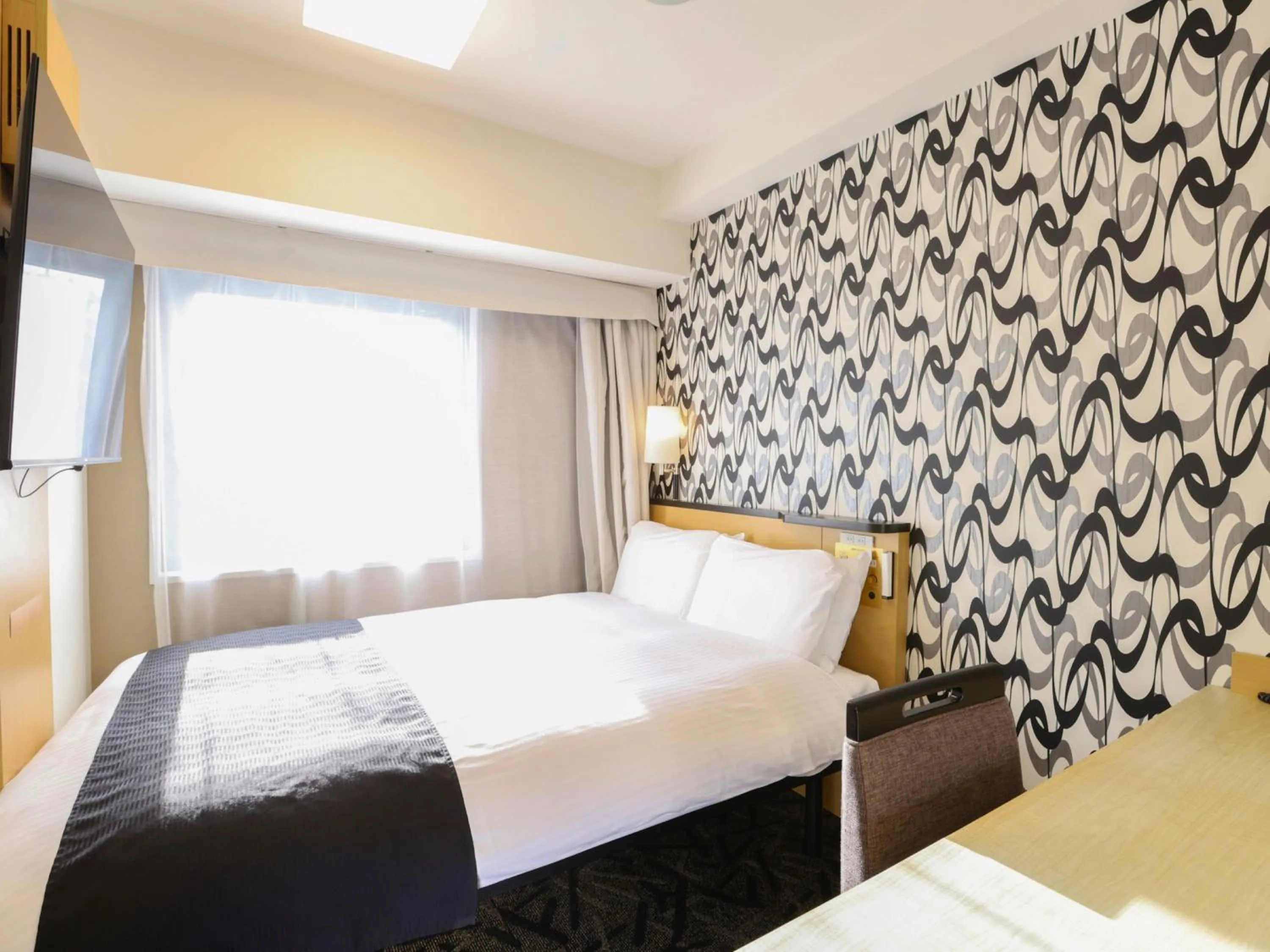 Bed in APA Hotel Ikebukuro Eki Kitaguchi