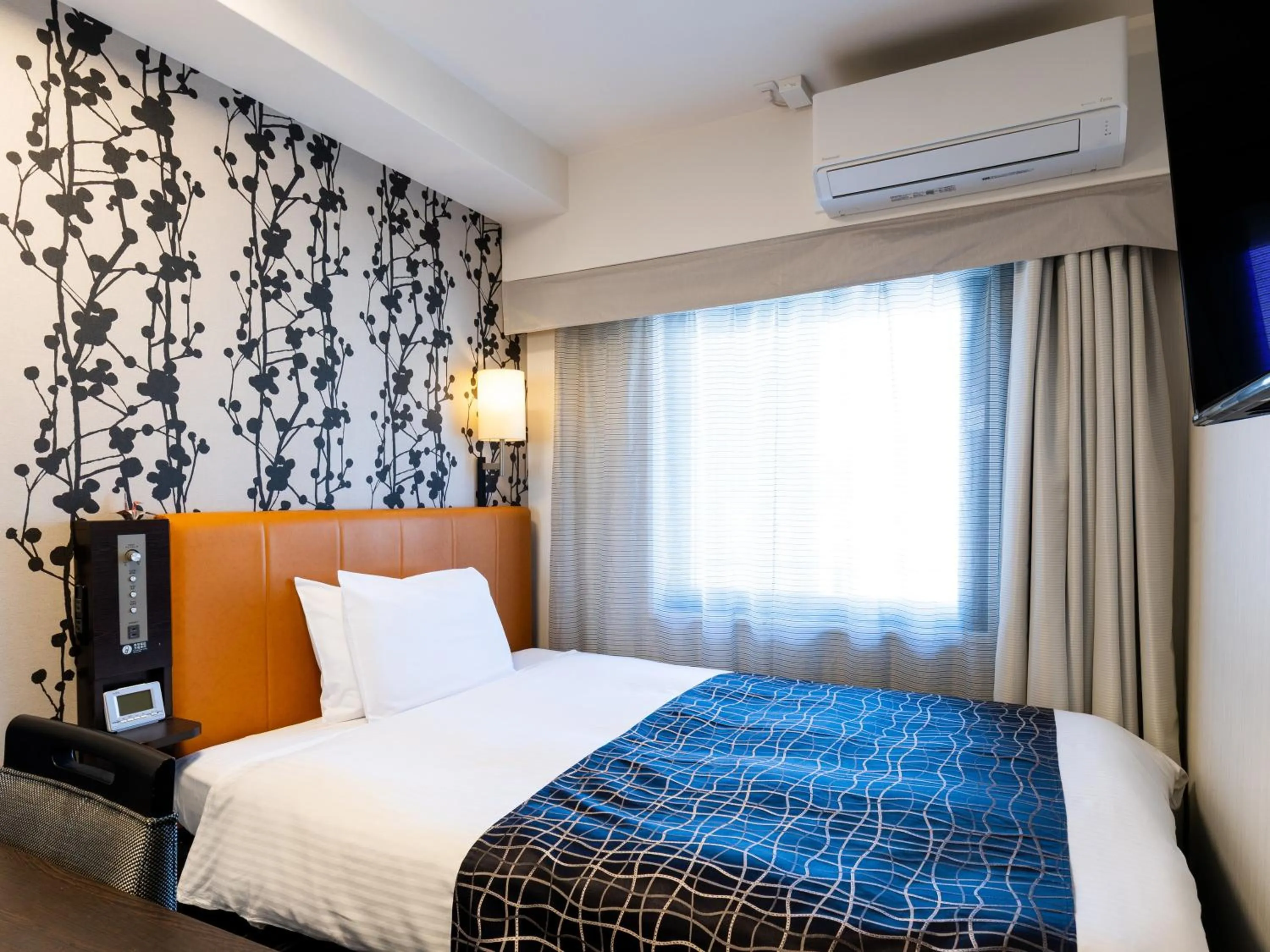 Bed in APA Hotel Namba Shinsaibashi