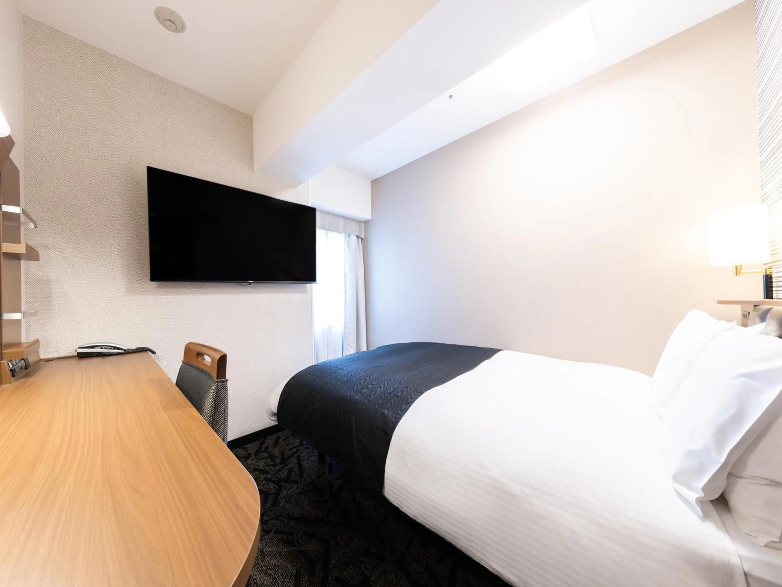 Photo of the whole room, Bed in APA Hotel Tennoji Ekimae