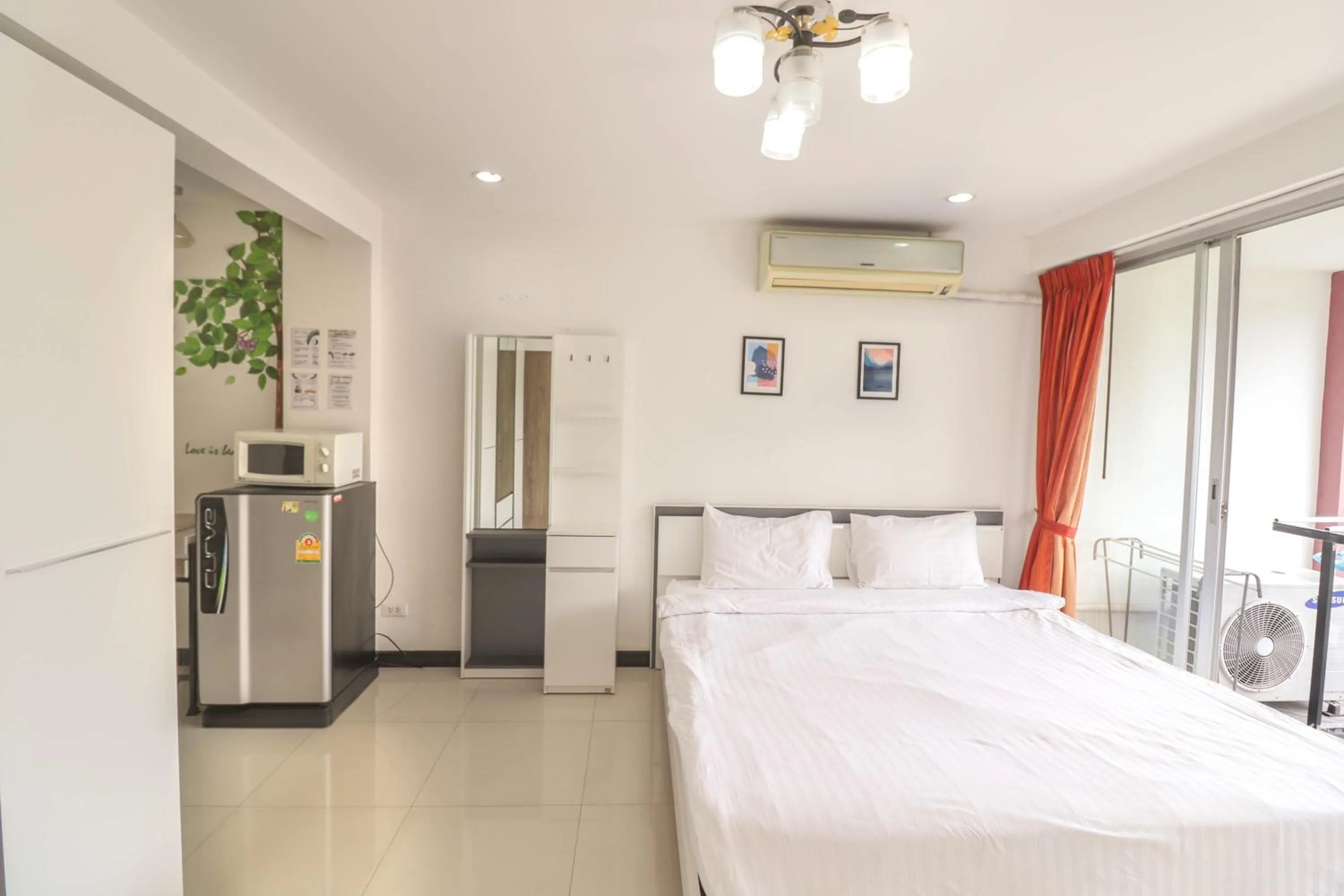 Bed in Baan Sabai Rama IV Apartment