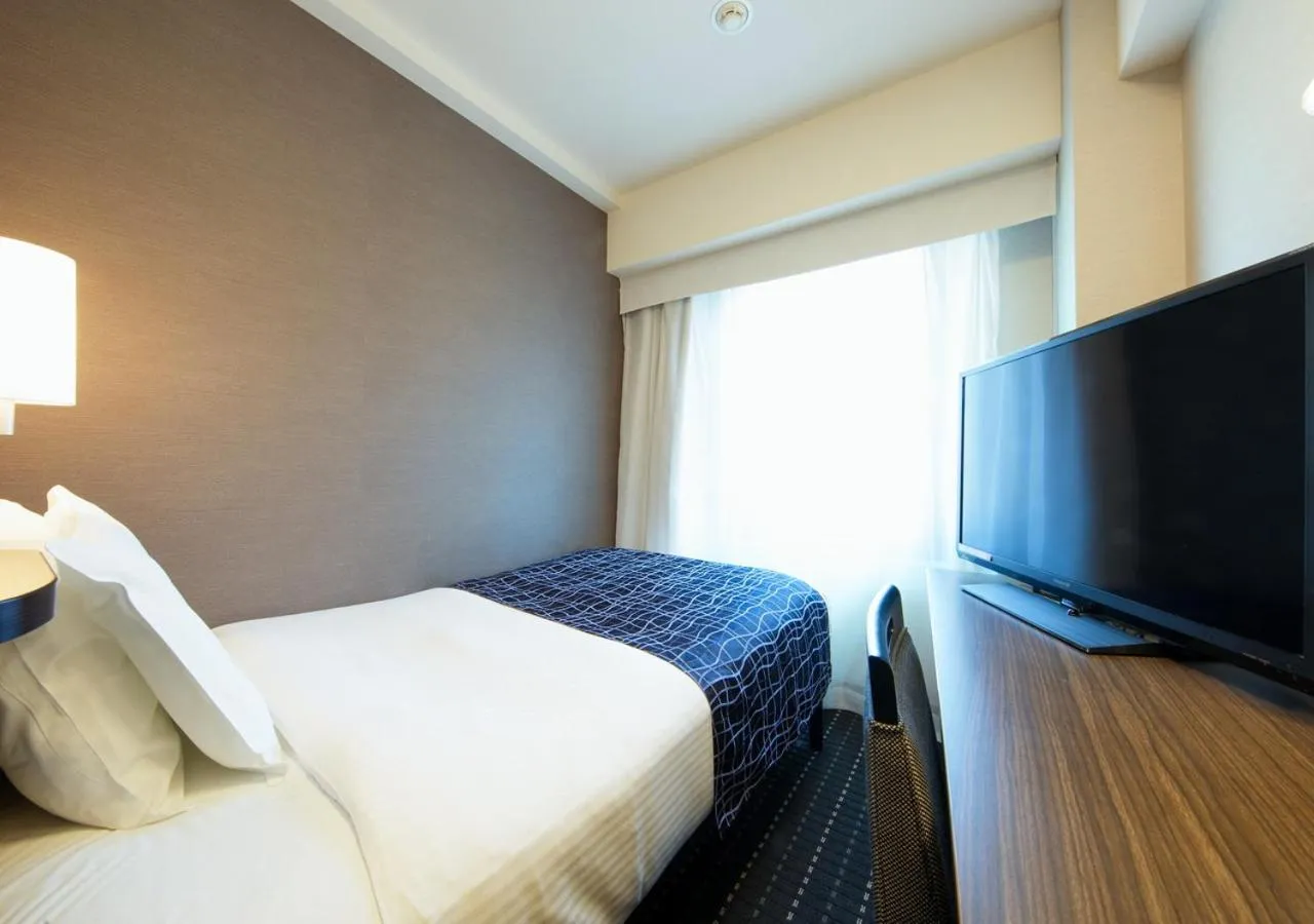 Photo of the whole room, Bed in APA Hotel Sakai Ekimae