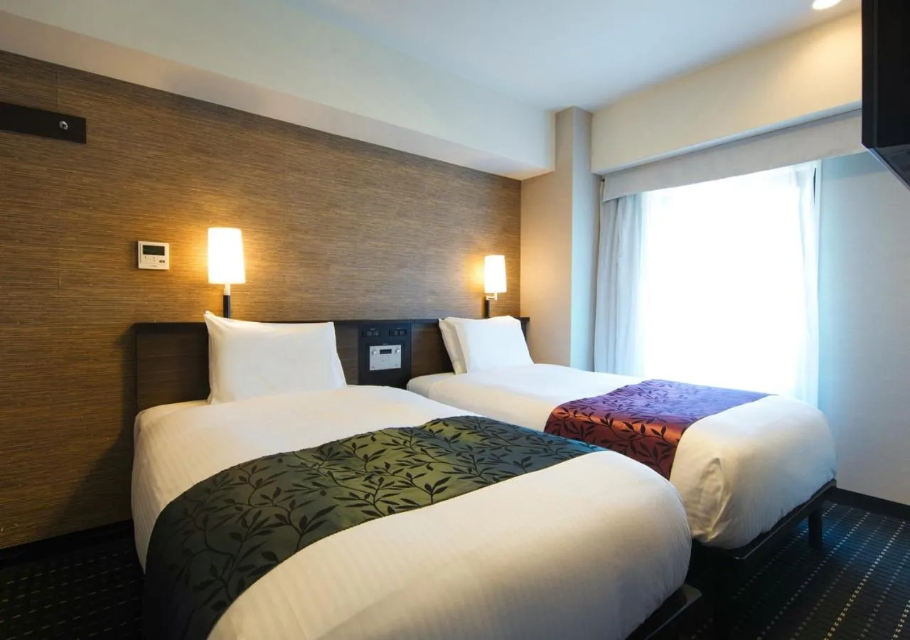 Photo of the whole room, Bed in APA Hotel Sakai Ekimae