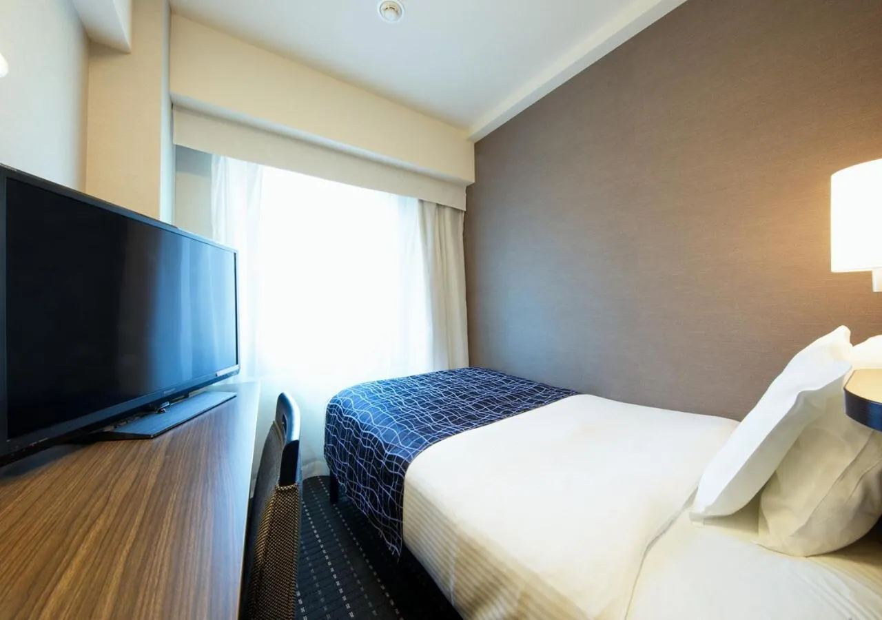 Photo of the whole room, Bed in APA Hotel Sakai Ekimae