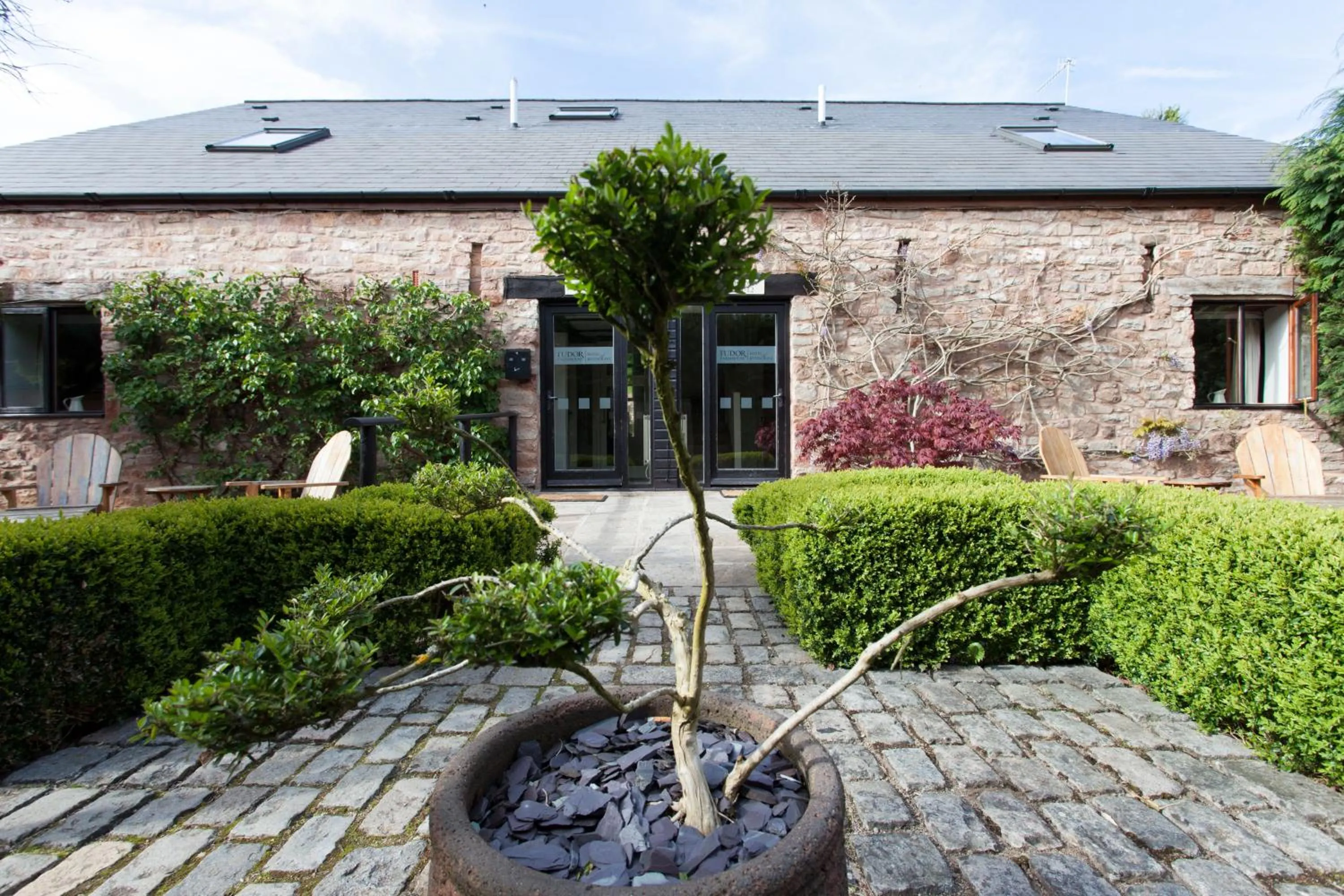 Facade/entrance in Tudor Farmhouse Hotel