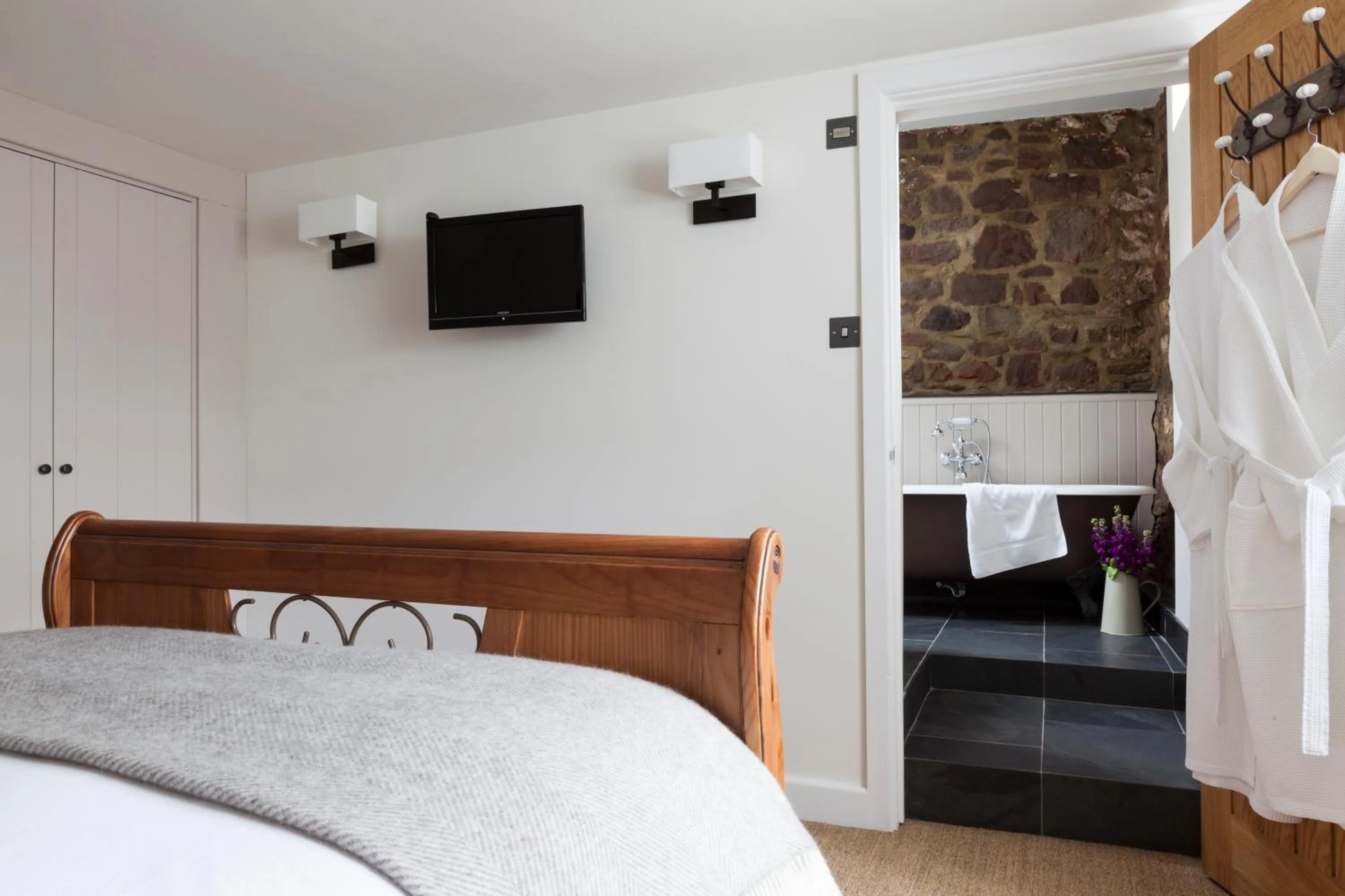 Decorative detail, Bed in Tudor Farmhouse Hotel