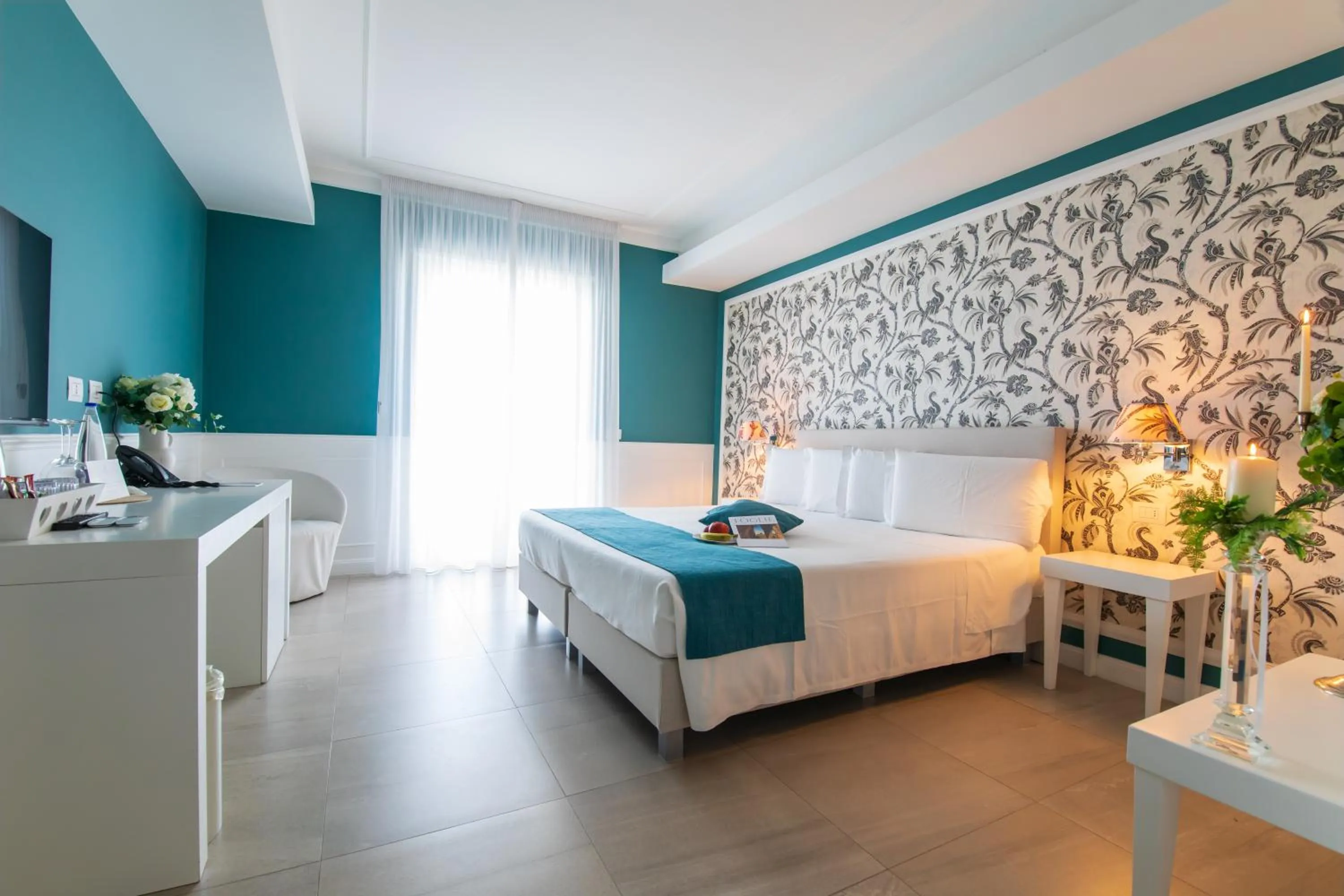 Bed in Bianco Riccio Suite Hotel