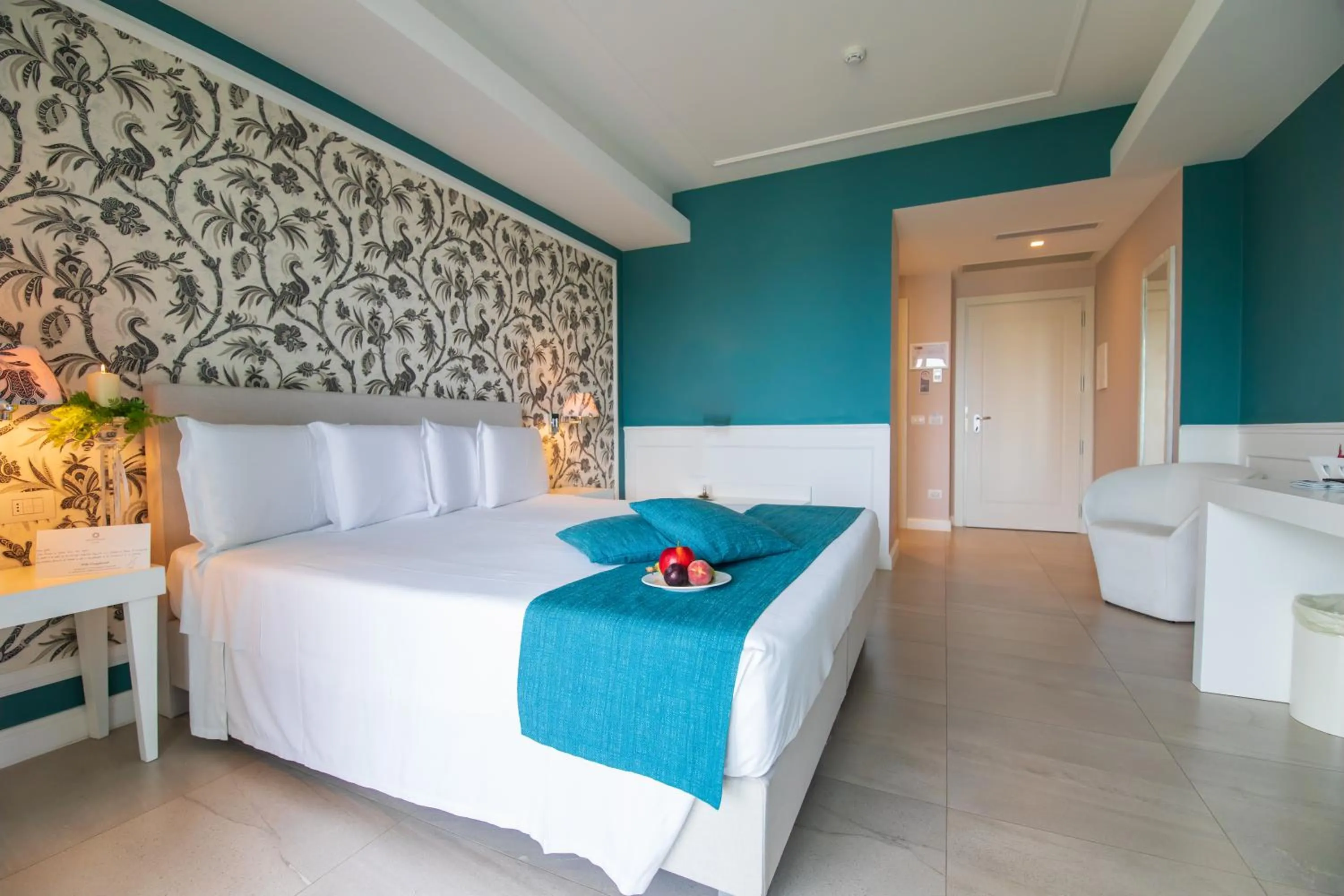 Bed in Bianco Riccio Suite Hotel